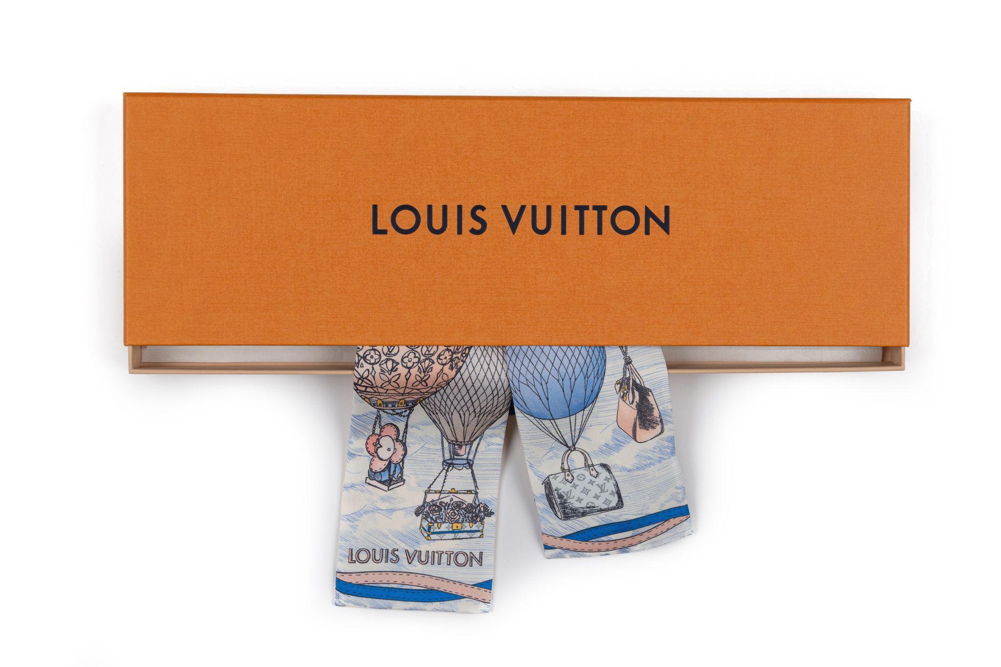 Louis Vuitton silk bandeau with hot air balloon design. Brand new in original box .