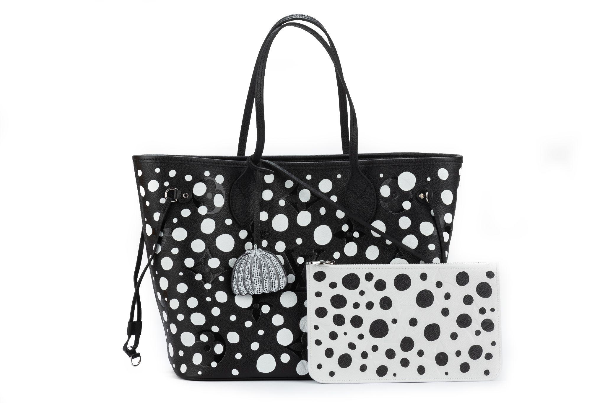 Louis Vuitton x Yayoi Kusama Neverfull in black and white. The bag features a galaxy of white dots on lustrous black Monogram Empreinte cowhide. Brand new and comes with the original dustcover and box.