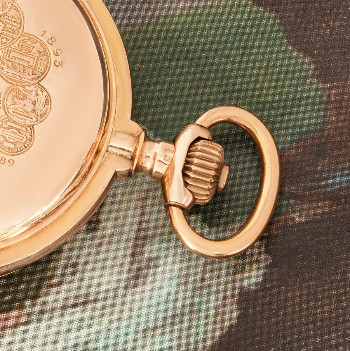 Vulcain. An 18ct Rose Gold Minute Repeater Calendar Chronograph Keyless Lever Full Hunter Pocket Watch C1890s.

Dial: The white enamel dial with Roman numerals outer minute track, the subsidiary date dial located at twelve o'clock. The phases of the
