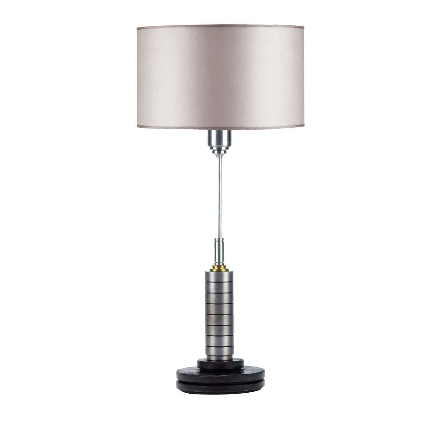 Stunning in every detail, this striking abat-jour showcases just a hint of midcentury allure with its polished steel structure while the light gray silk drum shade and Matrix marble round base infuse glamour and elegance. Marked by a slender