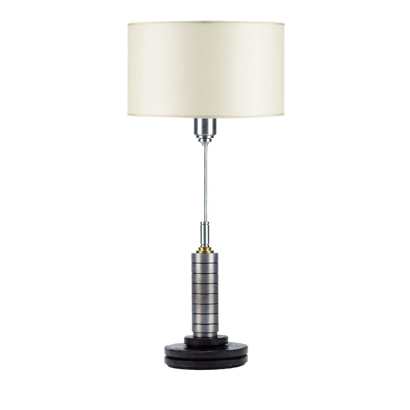 Masterful craftsmanship and luxurious material merge in this superb abat-jour whose metallic finish and white silk drum shade lend a glamorous touch to the modern silhouette. Raised on a round base of matrix marble topped by a cylindrical element,