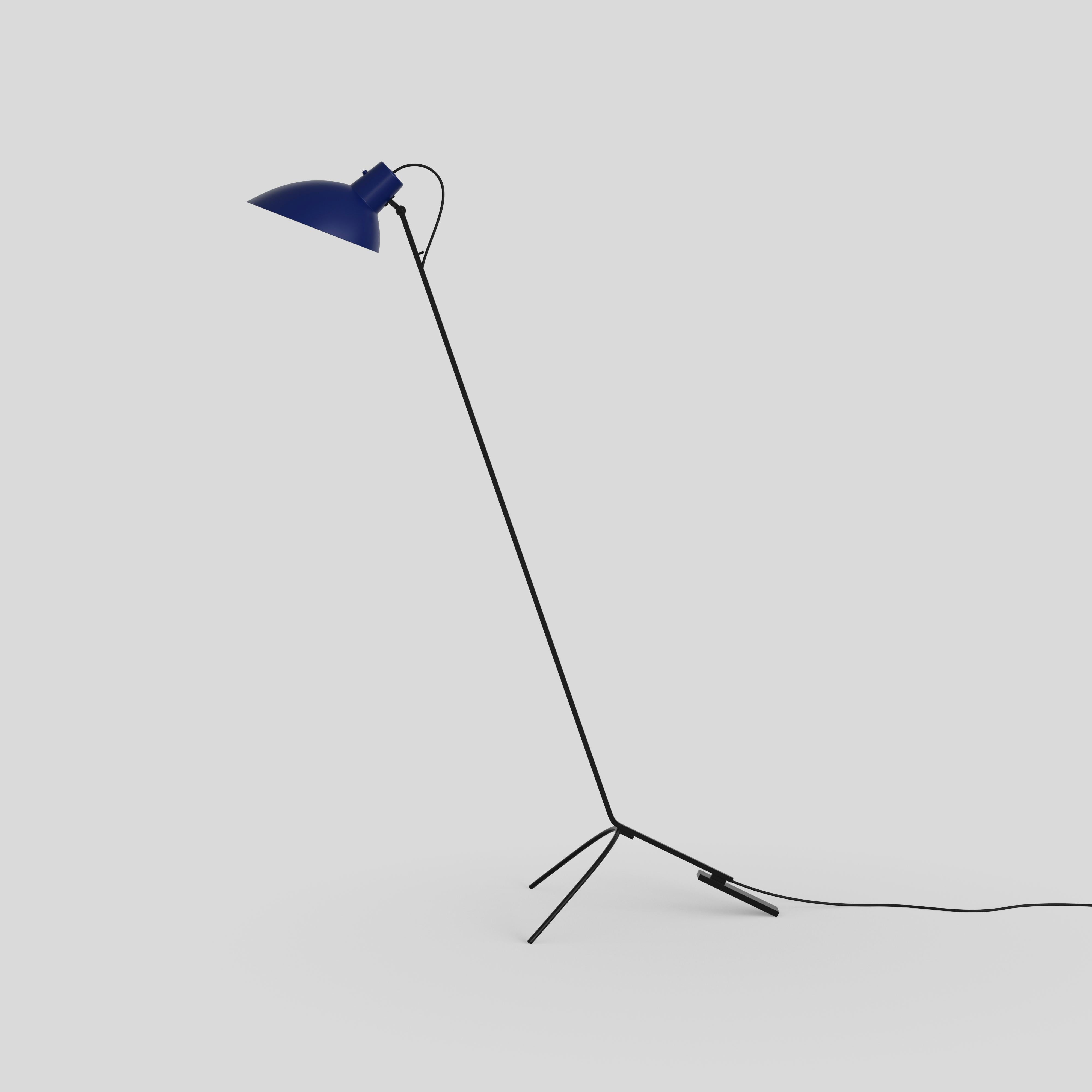 VV Cinquanta floor lamp
Design by Vittoriano Viganò
This version is with blue lacquered reflector and black frame.

The VV Cinquanta features an elegant and versatile posable direct light source that can swivel and tilt, from direct working light to