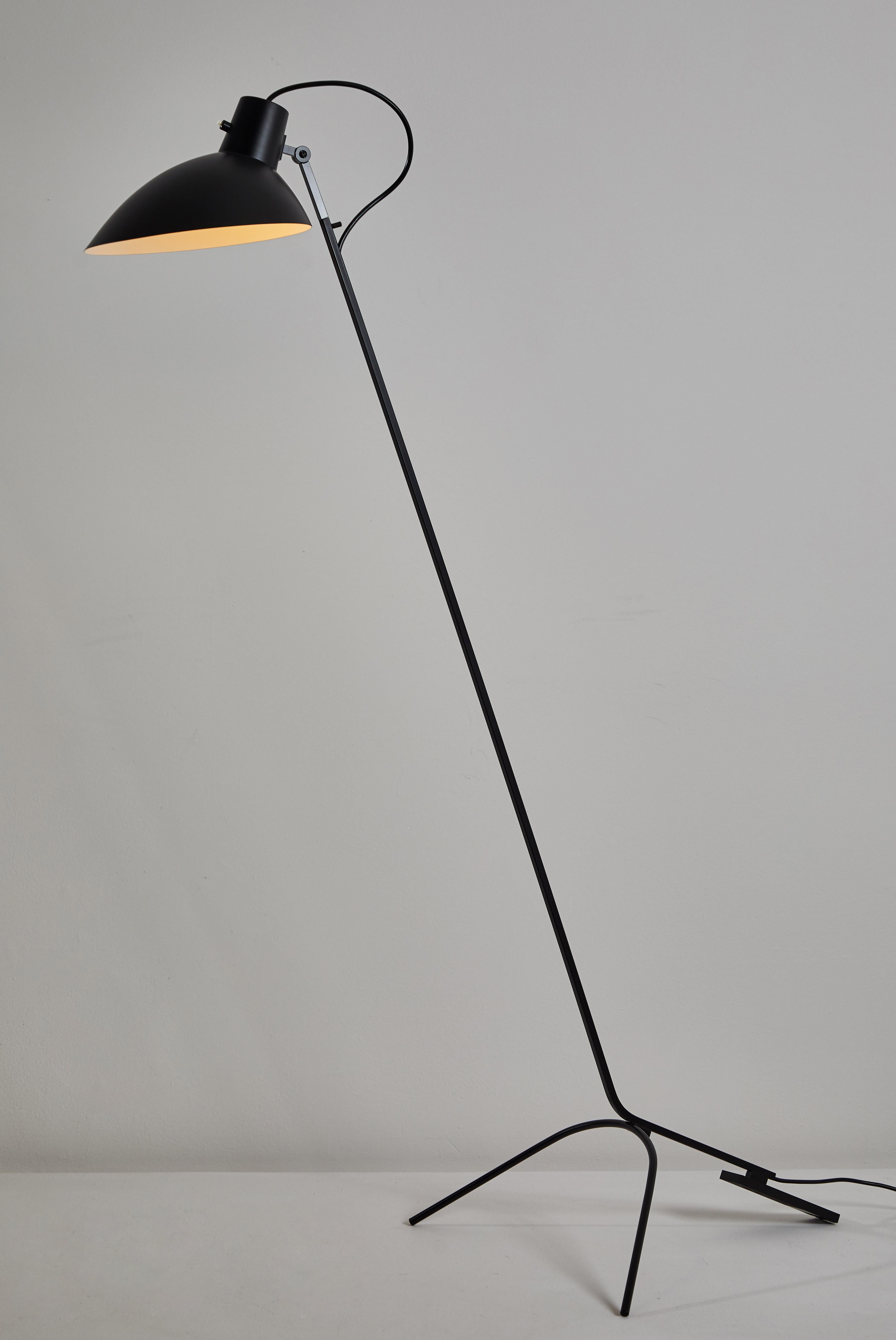 VV Cinquanta floor light by Vittoriano Viganó. Originally designed in Italy, 1951. This light is a current production with an 8-10 week lead time. Spun aluminum reflector, enameled steel structure. Reflector adjust to various positions. Takes one