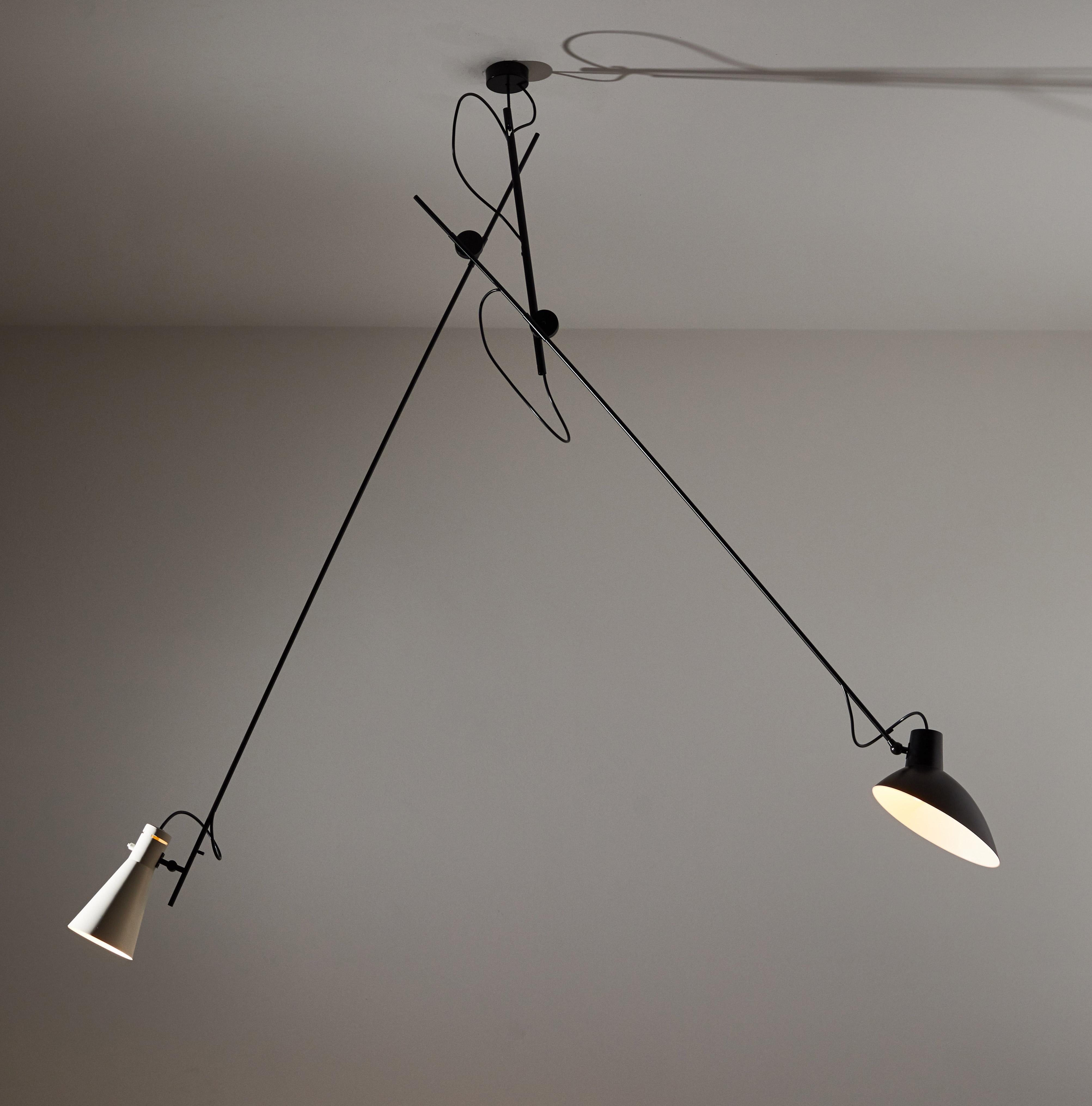 VV Cinquanta suspension light by Vittoriano Viganó. Originally designed in Italy, 1951. This light is a current production with an 8-10 week lead time. Spun aluminum reflectors, enameled steel structure. Reflectors and arms adjust to various