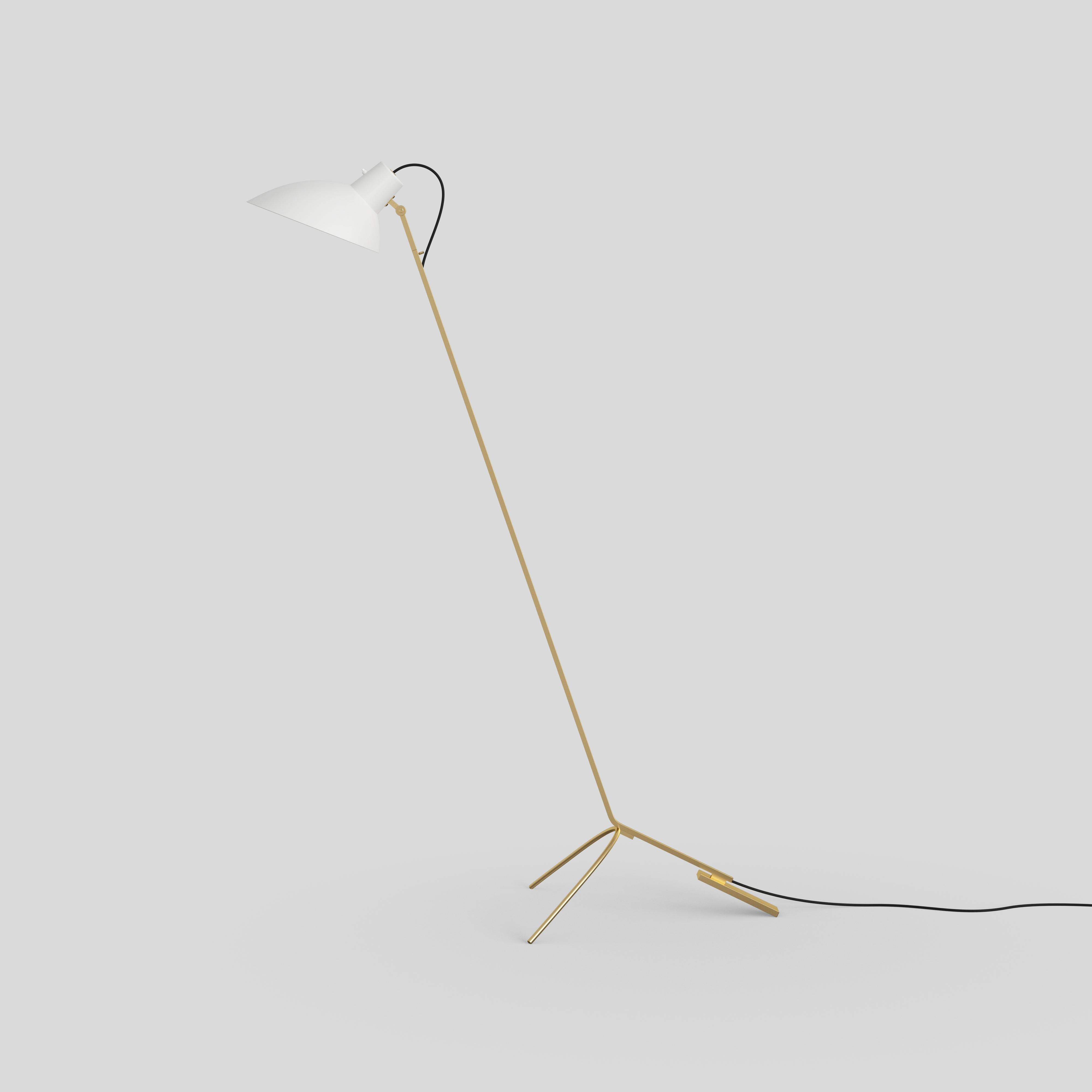 VV Cinquanta floor lamp
Design by Vittoriano Viganò
This version is with white lacquered reflector and brass frame.

The VV Cinquanta features an elegant and versatile posable direct light source that can swivel and tilt, from direct working light