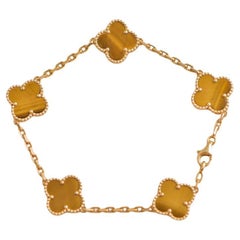 Bracelet vintage Alhambra à 5 motifs œil de tigre en or jaune VVan Cleef & Arpels