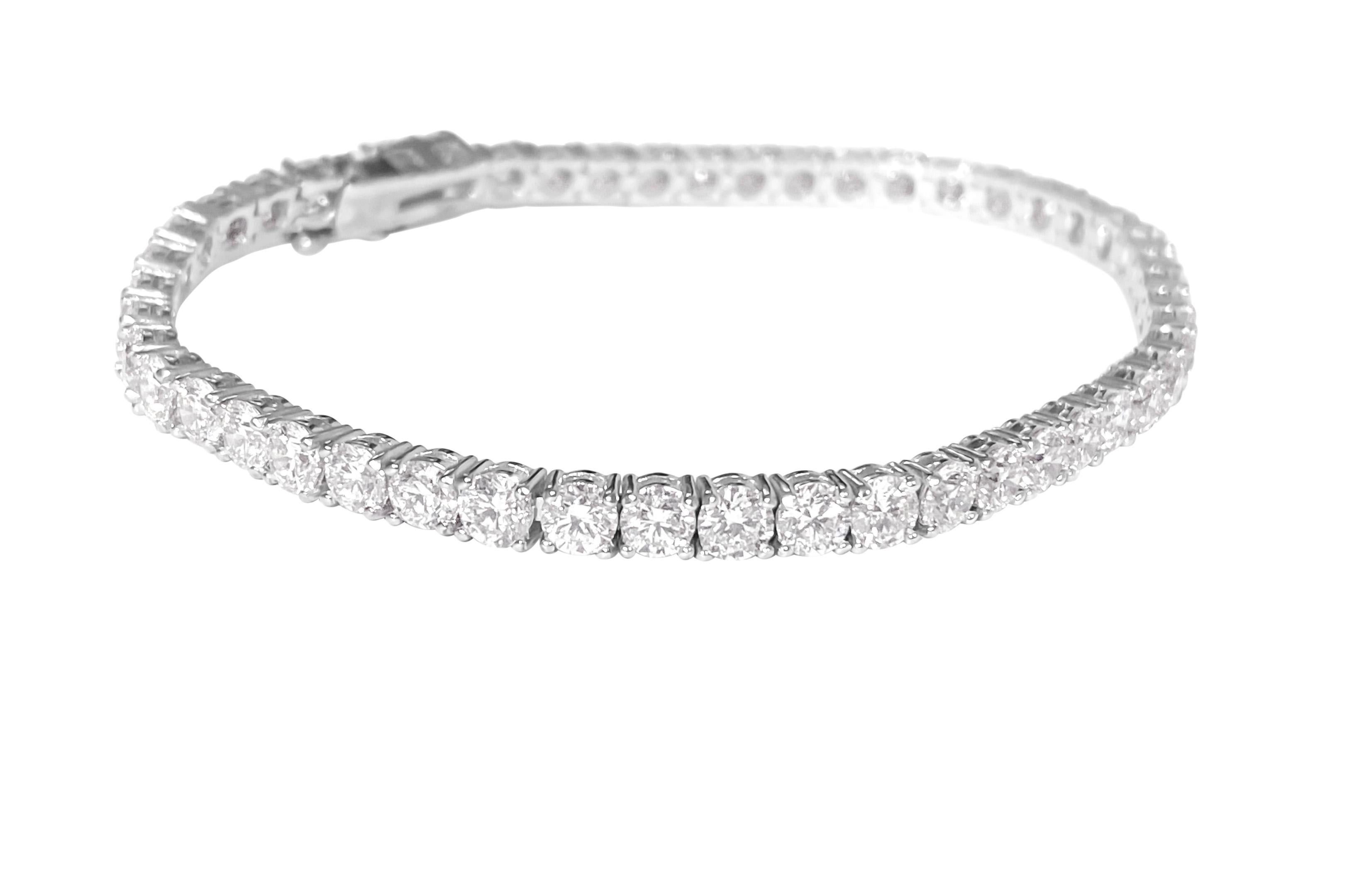 Elegance embodied in this exquisite piece! Behold a 14k white gold tennis bracelet adorned with 9.10 carats of round brilliant cut diamonds, boasting VVS clarity and sourced entirely from natural earth mines.

Key Features:

Metal: Shimmering 14k