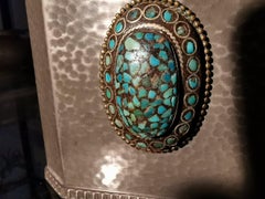 W A Perry an Arts & Crafts Hand Hammered Pewter Box with an Oval Turquoise Jewel