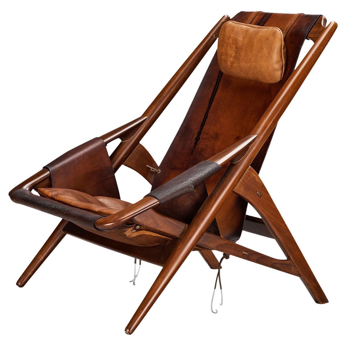 W. Andersag Lounge Chair in Patinated Cognac Leather and Teak  For Sale