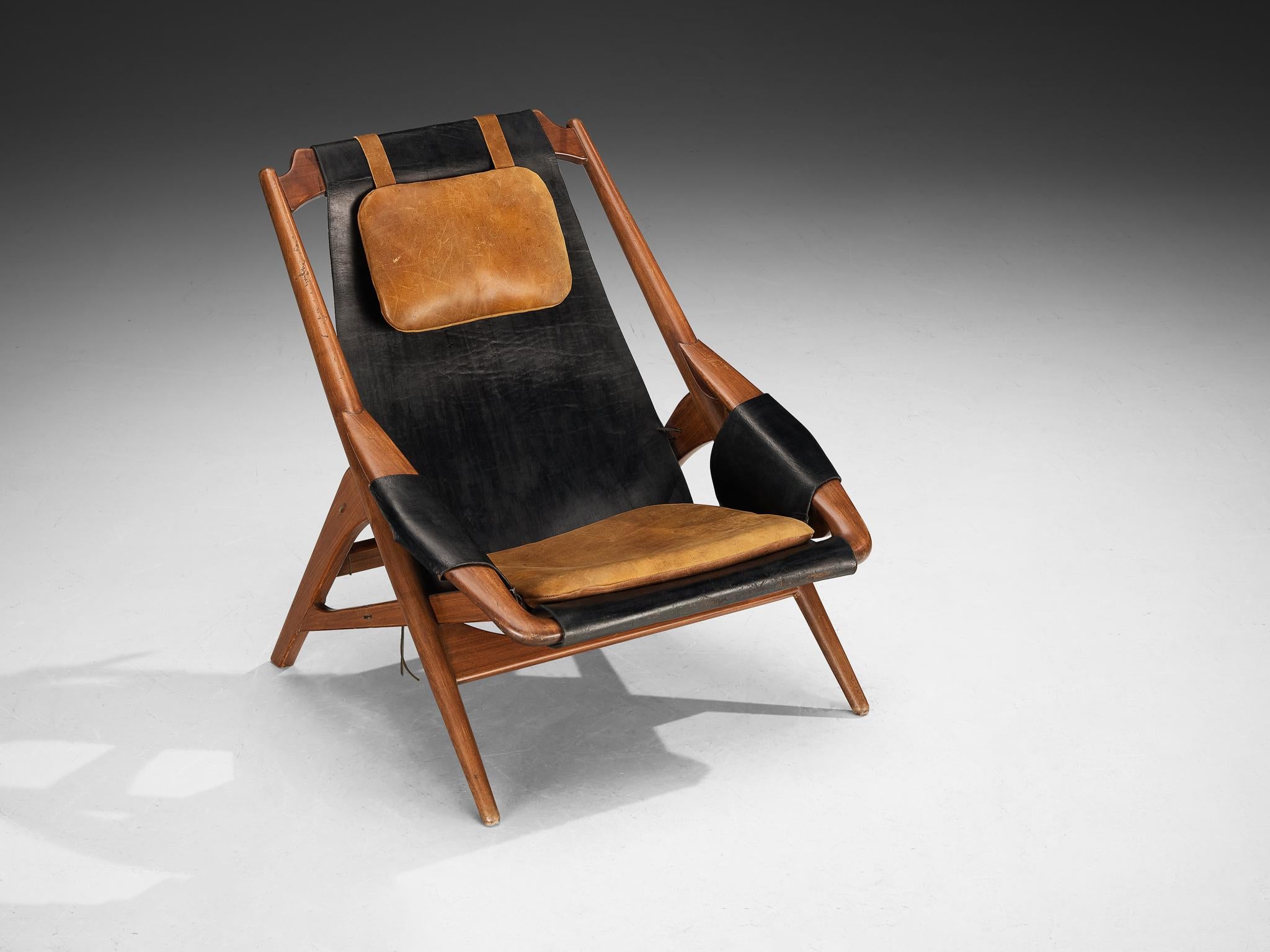 W.D. A. Steele, sedia da salotto, teak, pelle, acciaio, Italia, anni '60

Questa splendida poltrona, disegnata da W.D. A. Ansersag, sfoggia un'estetica dinamica caratterizzata dalle linee decise delle sue cornici in legno. La struttura robusta evoca
