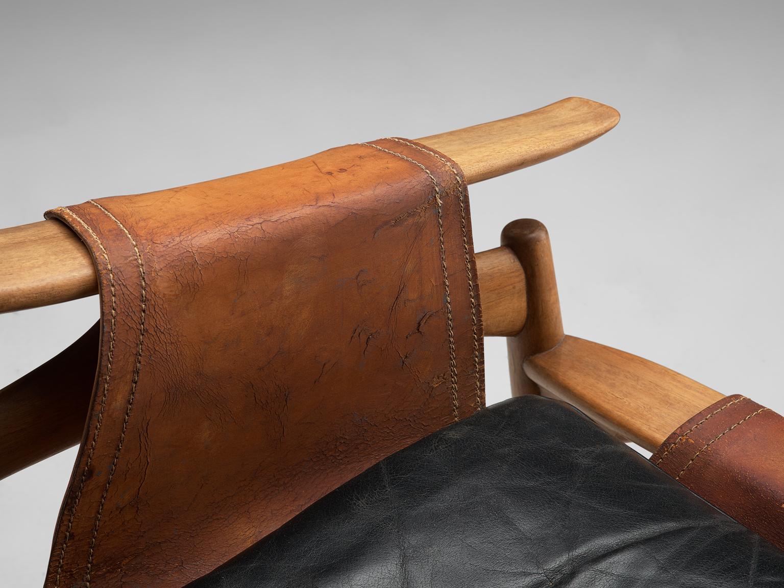 W. Andersag Schaukelstuhl aus Teakholz und Original-Leder (Italienisch)