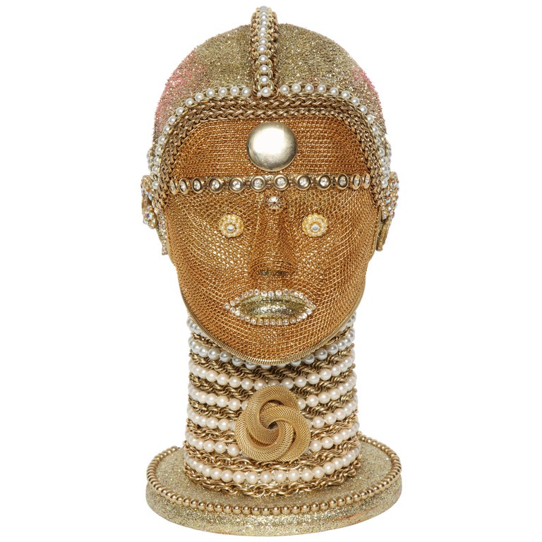 Stunning futuristic android bust by W. Beaupre. Bust is embellished with intricate gold chain, pearls and vintage jewelry findings. The attention to detail and craftsmanship is quite remarkable.