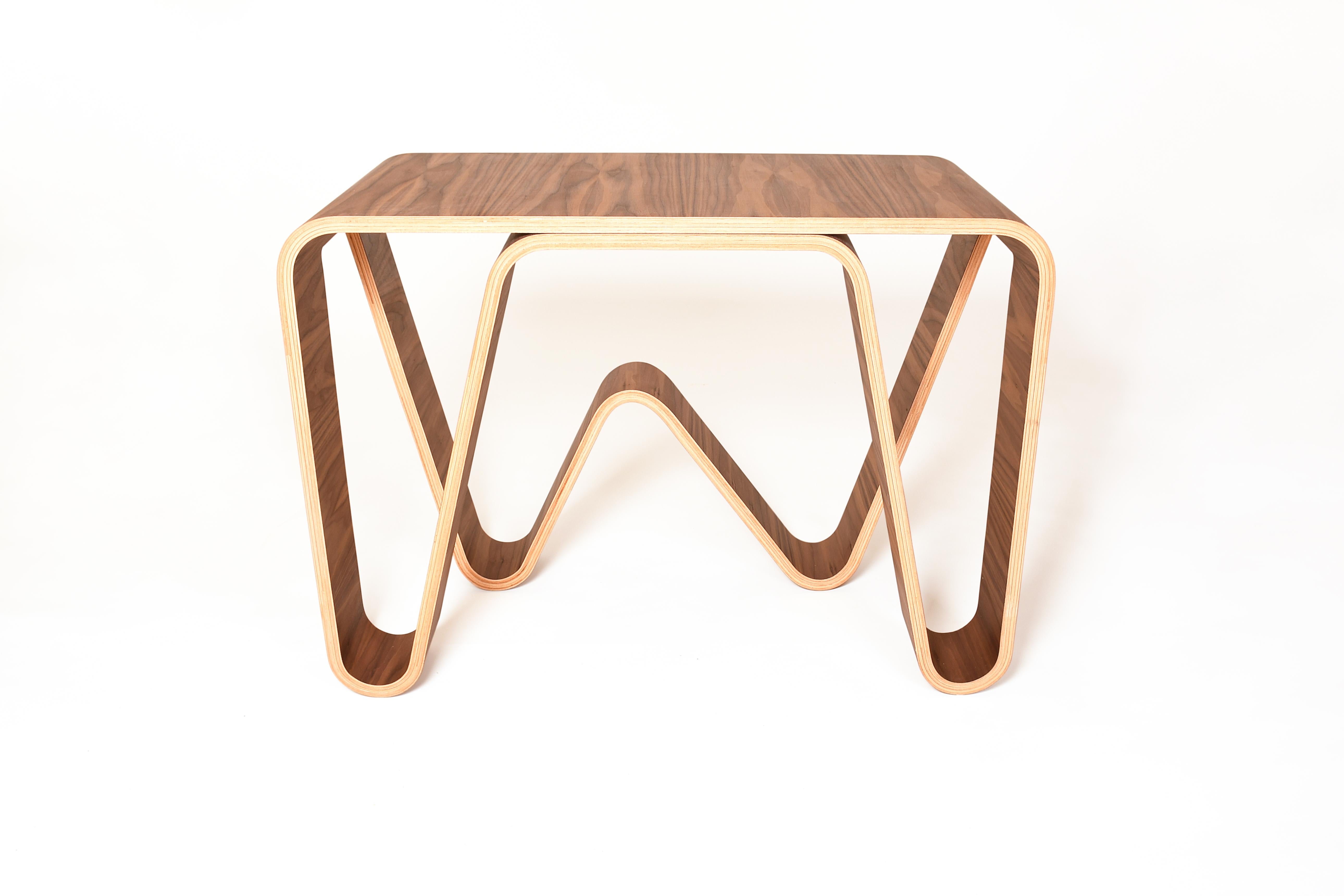 The design of this desk is unique and spectacular, it would be a great touch of modernity in your home design.
It is the result of all my research into wood bending, to create this piece I had to use several techniques.

This desk is made with