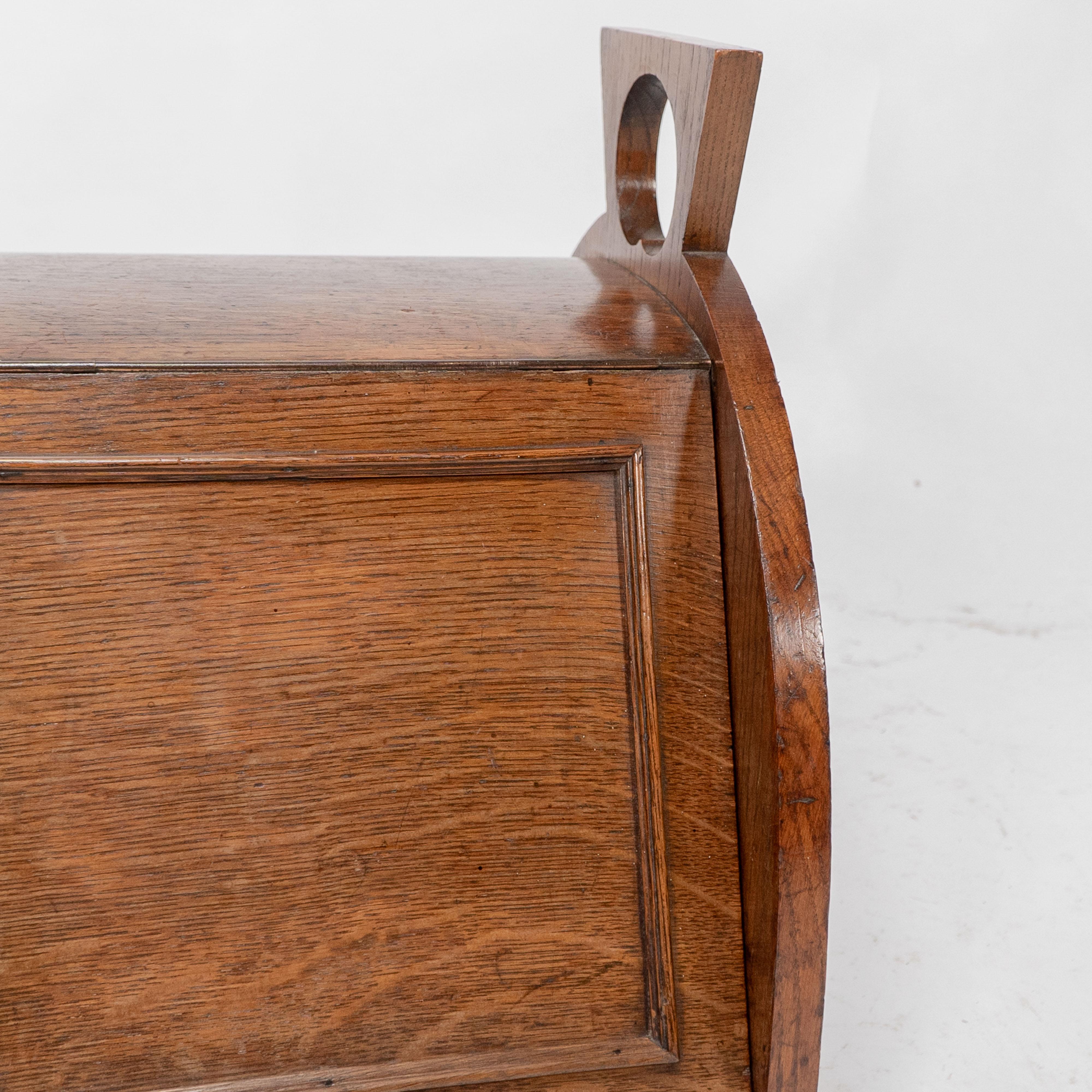 W J Neatby attri. An Arts & Crafts oak coal box with stylized carrying handles For Sale 4