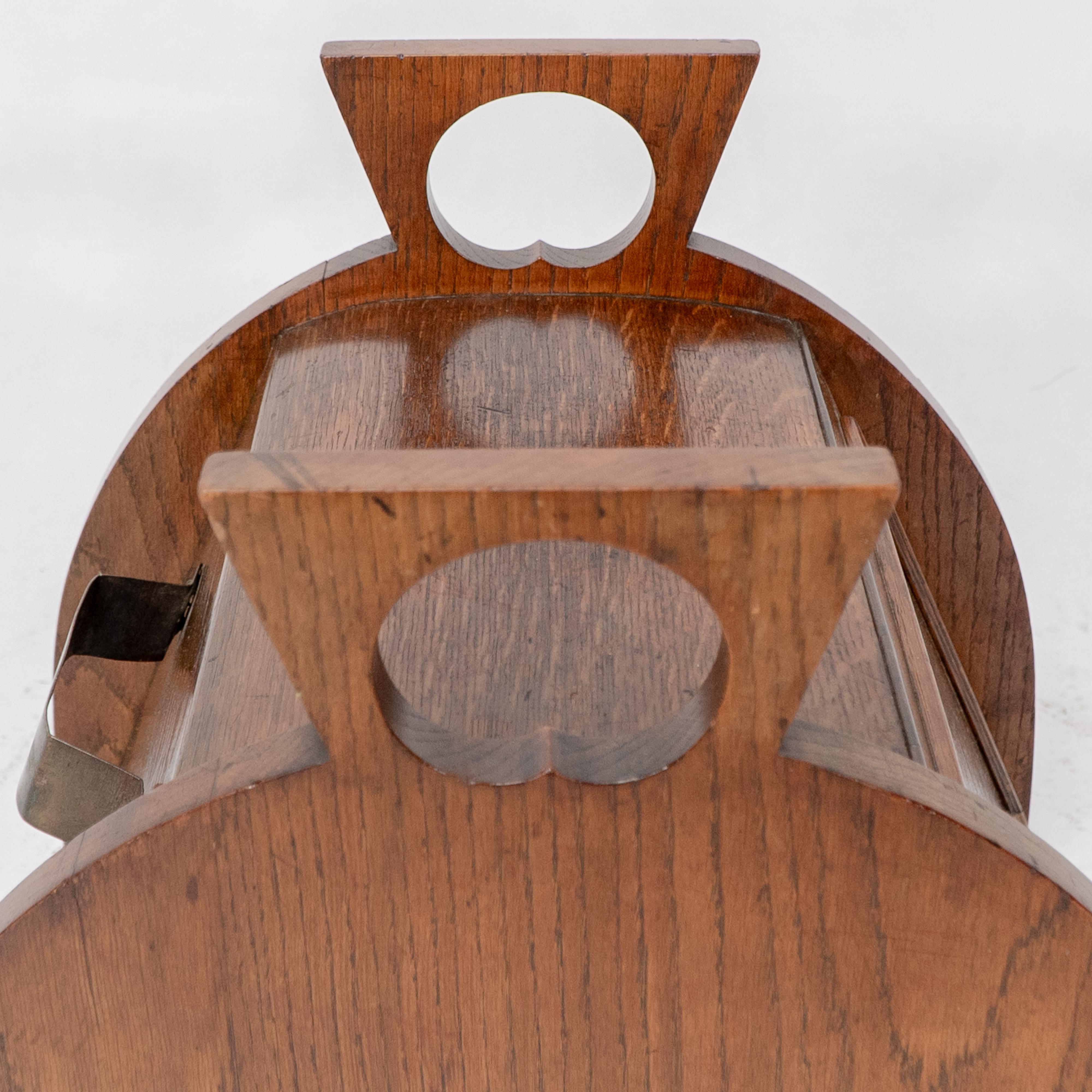 W J Neatby attri. An Arts & Crafts oak coal box with stylized carrying handles For Sale 8