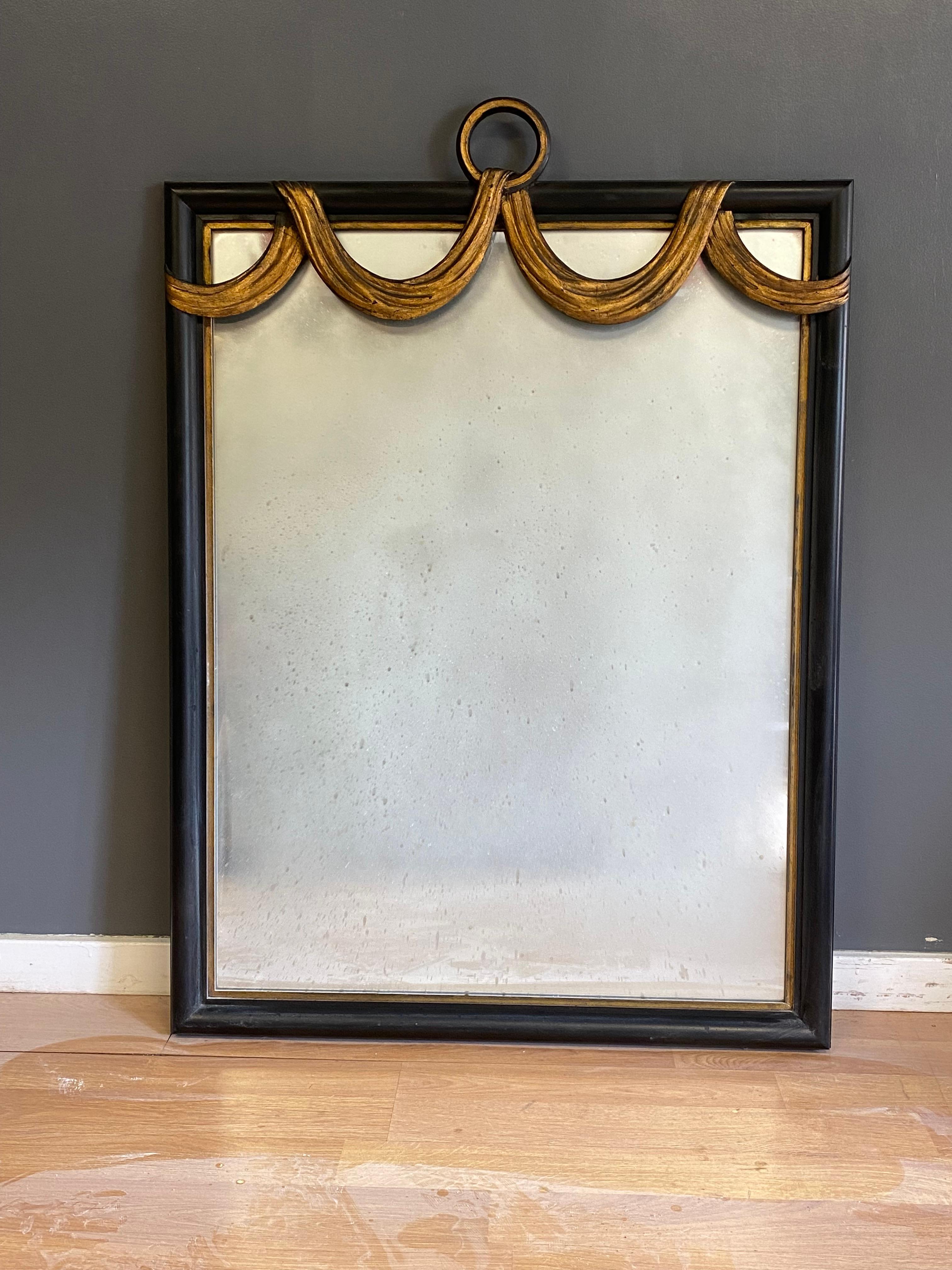 W. & J. Sloane Hollywood Regency Ebonized and Parcel Gilt Swag Wall Mirror In Good Condition In Garnerville, NY