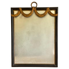 W. & J. Sloane Hollywood Regency Ebonized and Parcel Gilt Swag Wall Mirror