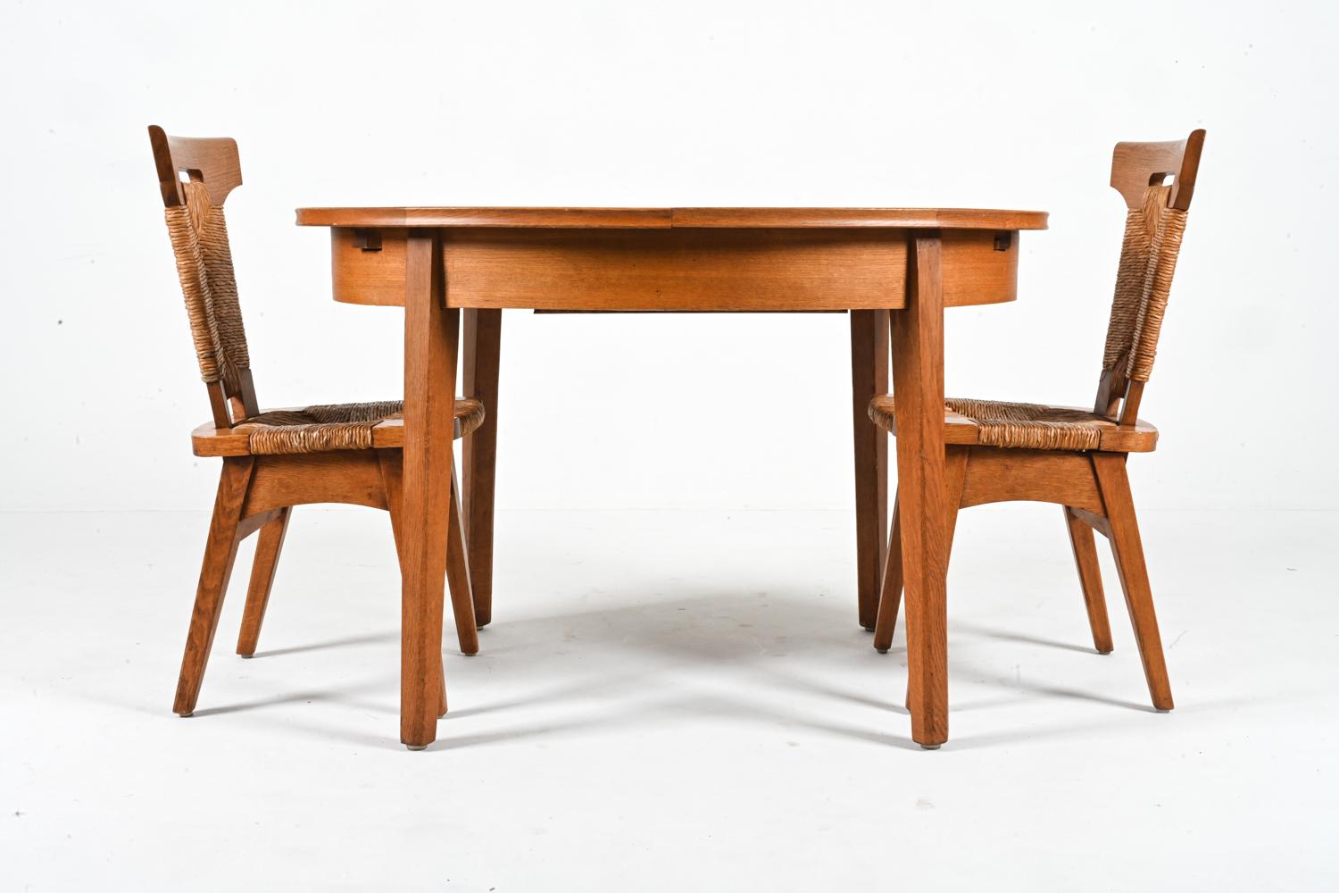 20th Century W. Kuyper Dutch Arts & Crafts Dining Suite in Oak & Rush, c. 1920s For Sale