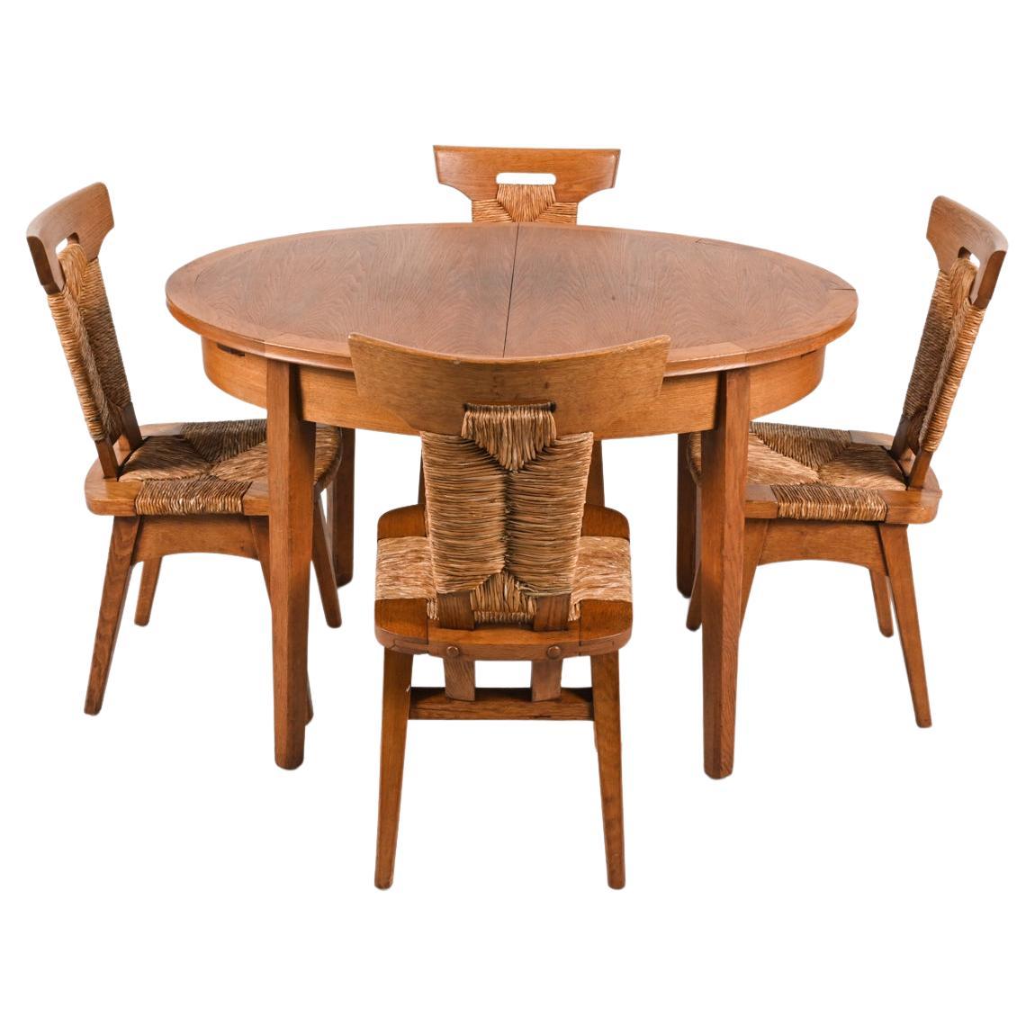 W. Kuyper Dutch Arts & Crafts Dining Suite in Oak & Rush, c. 1920s For Sale