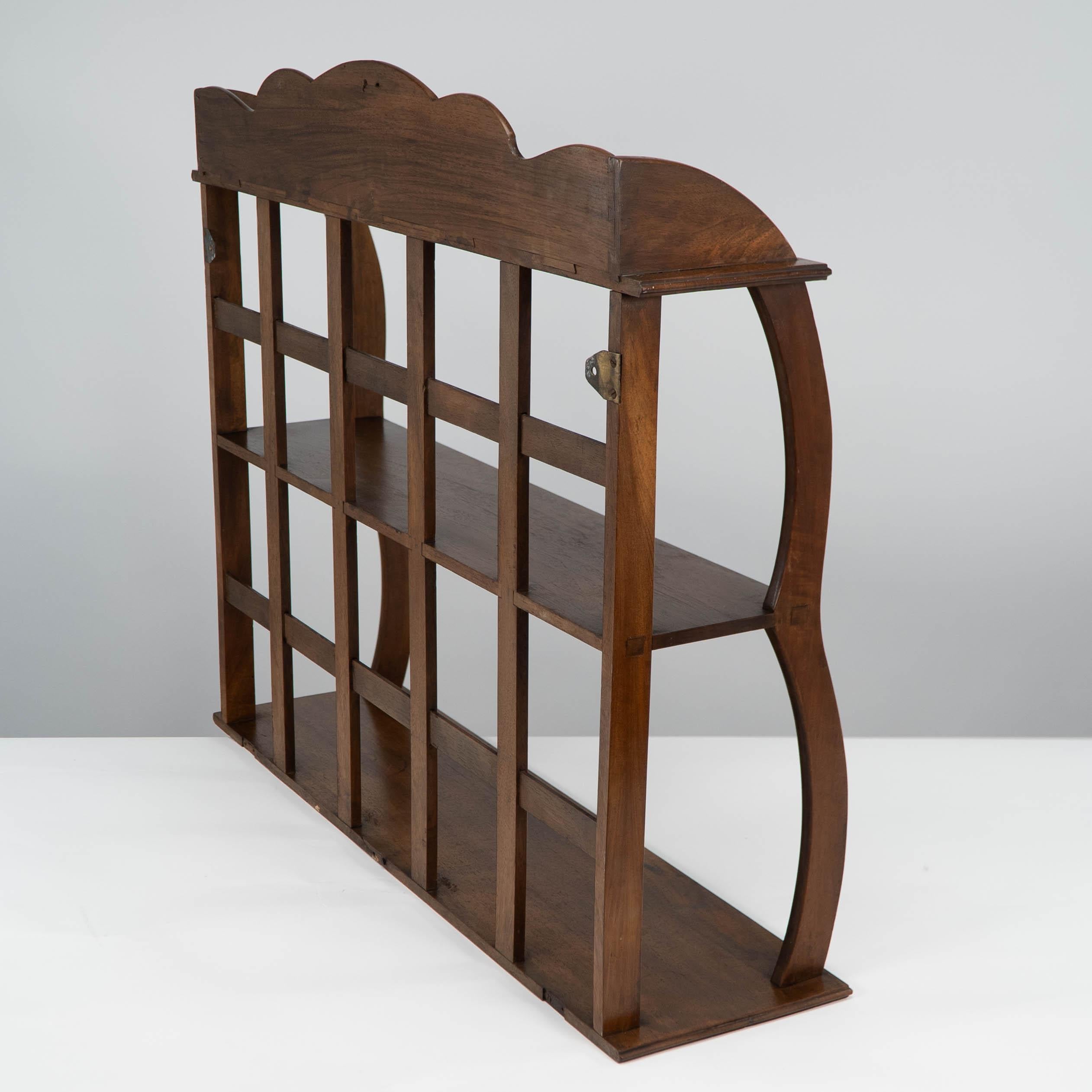 W. R. Lethaby. A Cotswold School Arts and Crafts walnut waterfall wall shelf In Good Condition For Sale In London, GB
