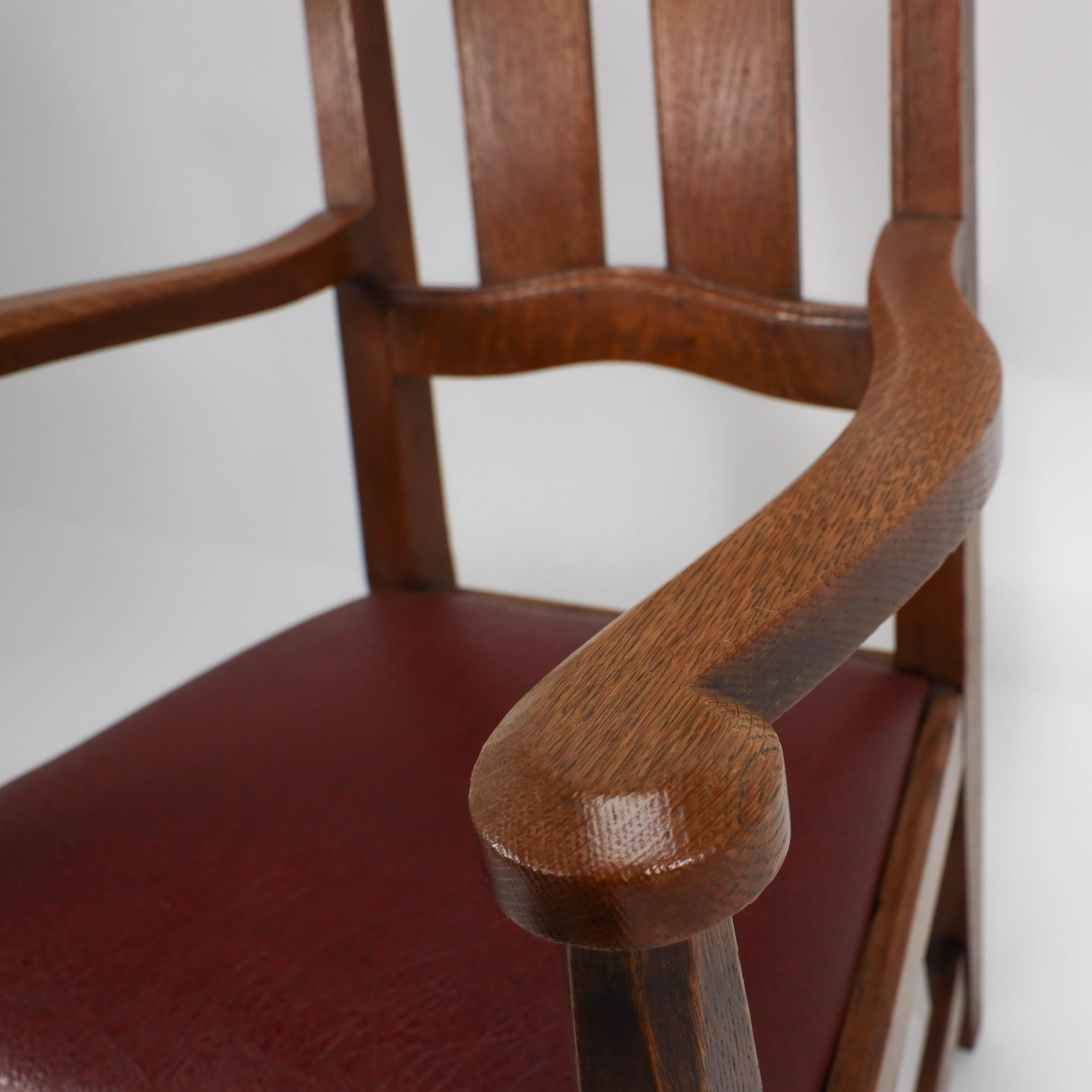 W R Lethaby. A rare Arts & Crafts sculptured oak armchair with shaped arms For Sale 1