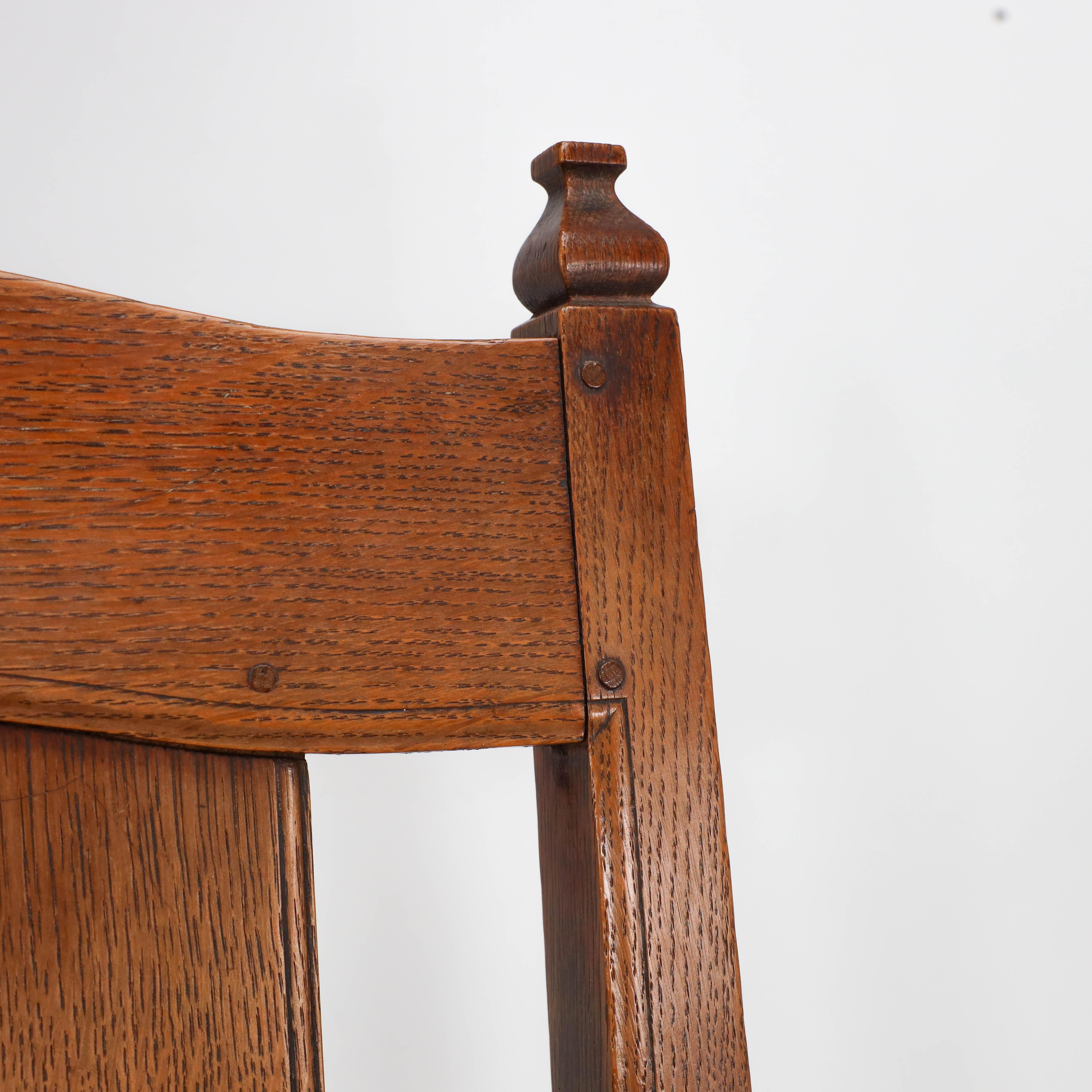 Hand-Crafted W R Lethaby. A rare Arts & Crafts sculptured oak armchair with shaped arms For Sale