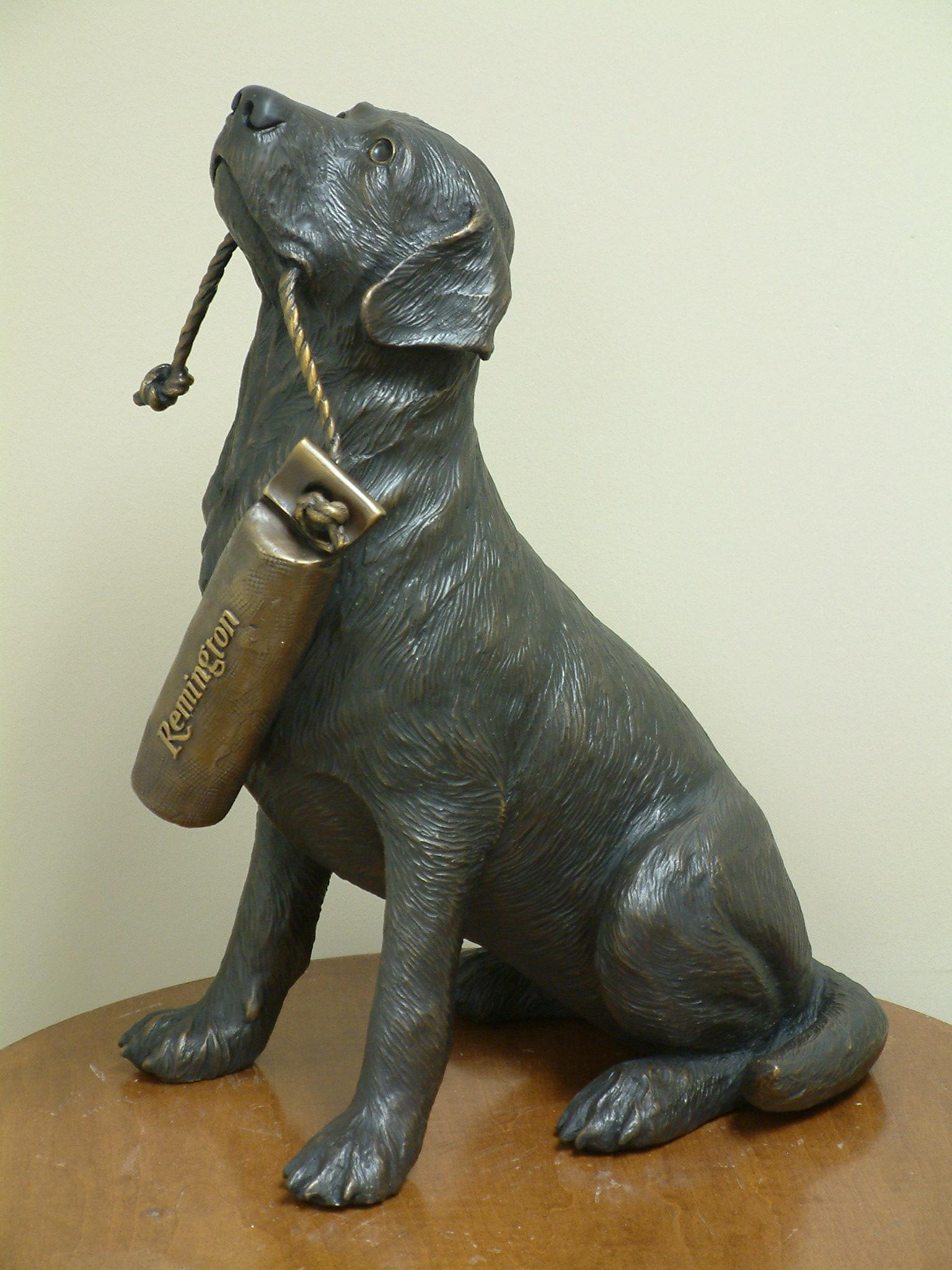 Has been in artist's private collection. 

Maquette hunting dog with training dummy.