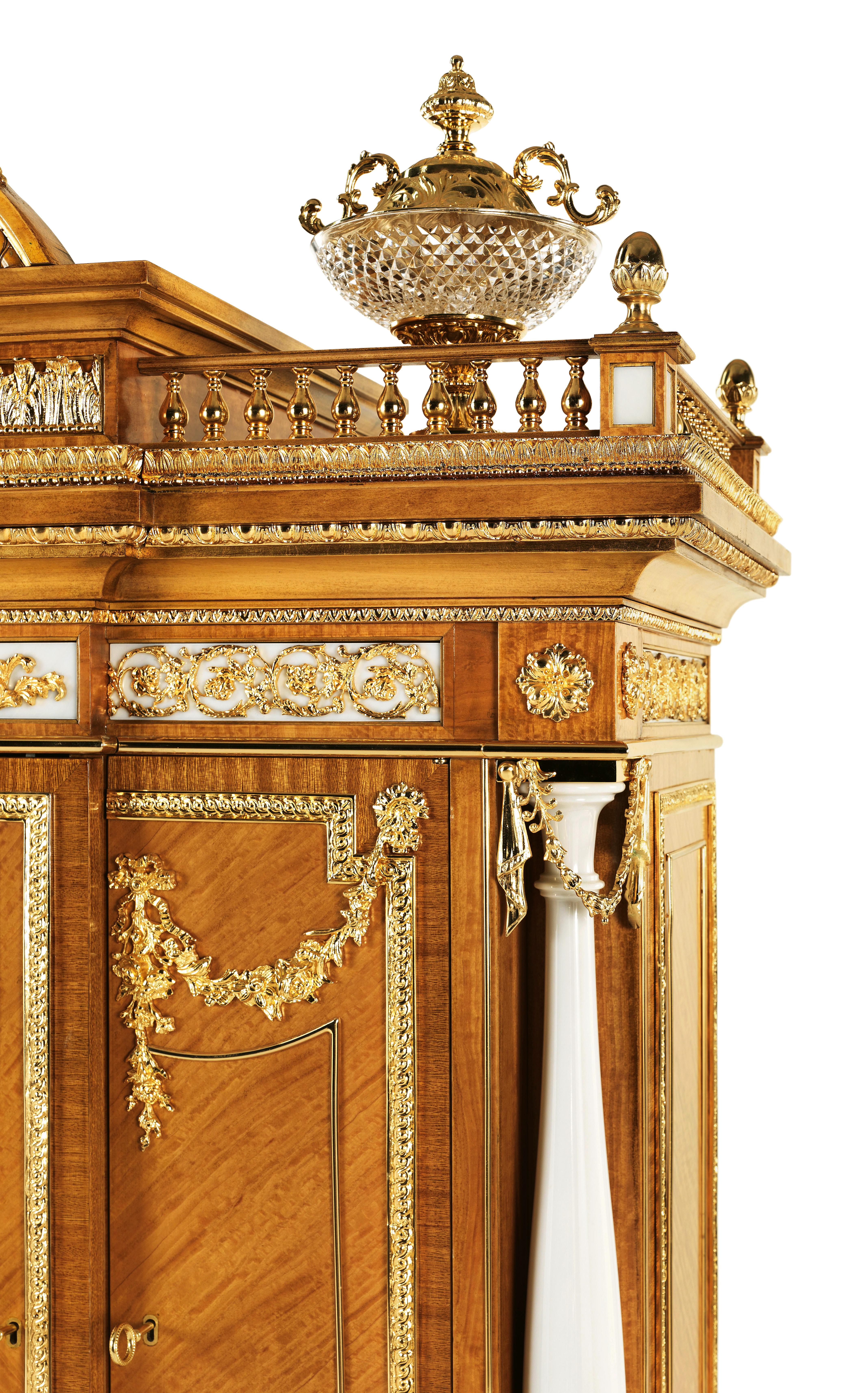 W029 is a masterpiece cabinet in citronnier, with 46 marble “Bianco B” elements, crystal bowls, 70 Kg of brass details finishing gold 24 Kts, bas-relief in marble, inlaid in mother of pearl inside.

Please Note: 
- If the item is to be shipped to