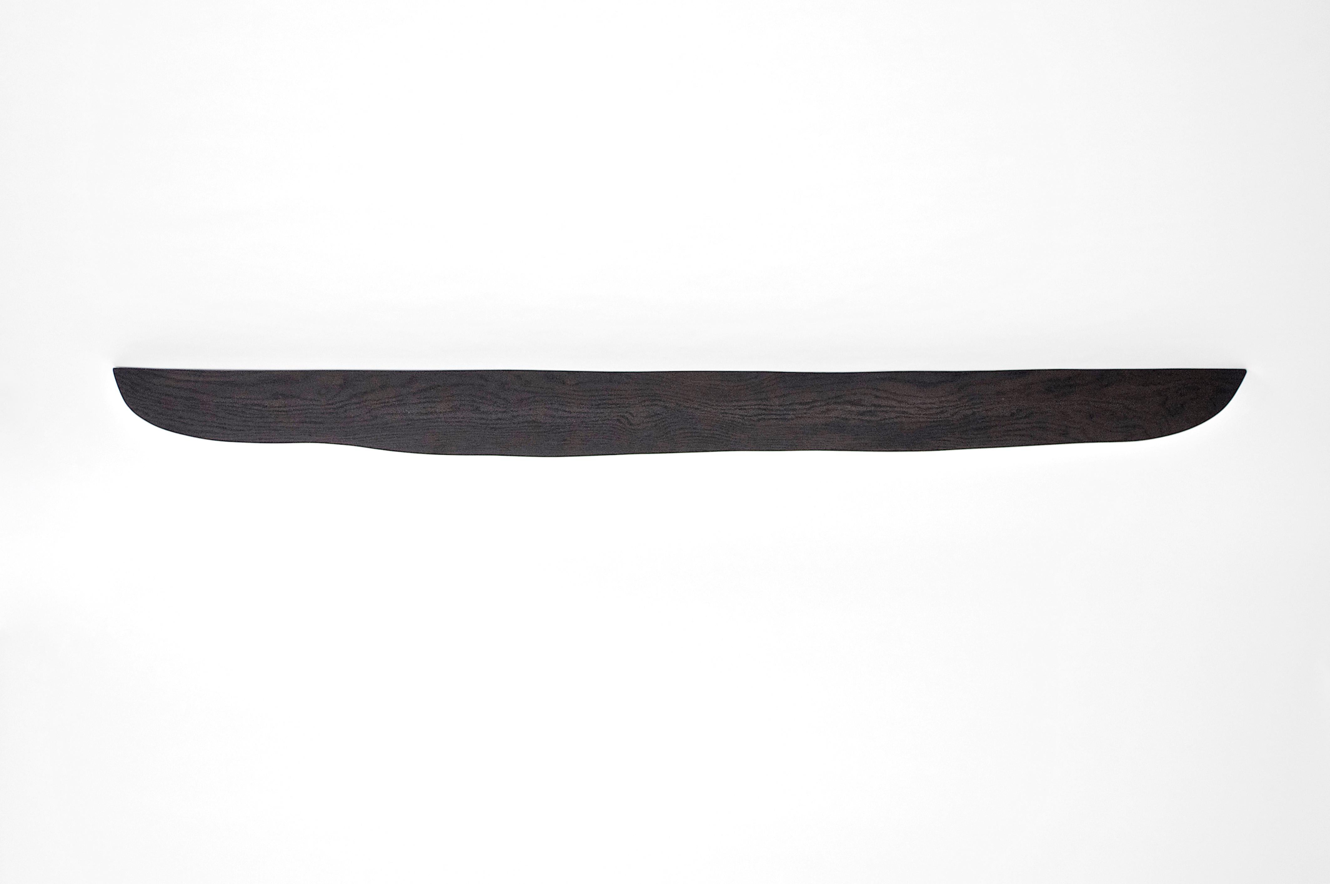 W1275 Wall Hanging Shelf in Bog Oak Wood by Jörg Pietschmann
Dimensions: D 16,5 x W 200 x H 3 cm.
Materials: Oak wood.

All wall shelves include steel pin holders for discreet mounting. Please contact us.

In Pietschmann’s sculptures, trees that for