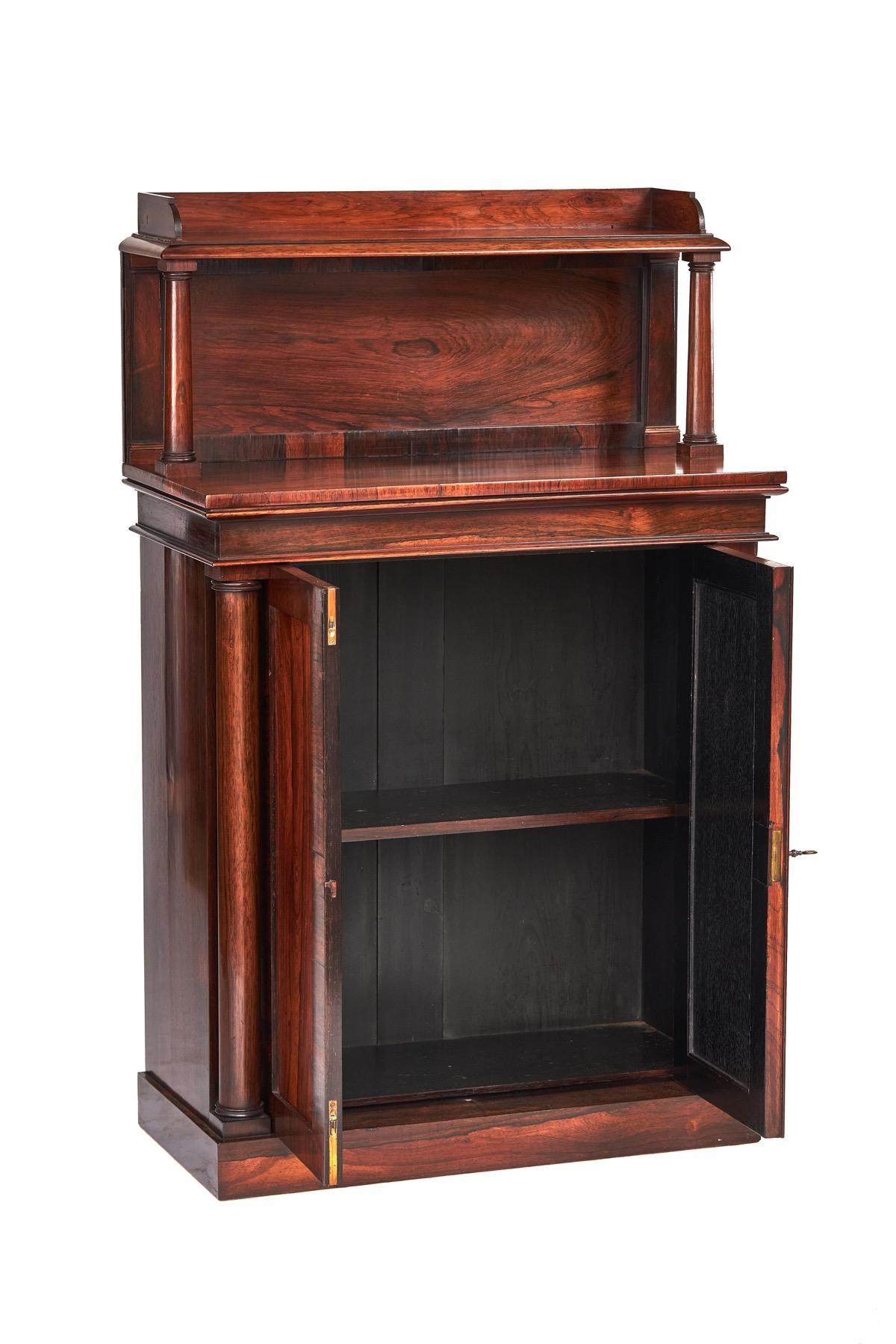W1V Period Rosewood Chiffonier, 
Top with inset panel back, 
Pair Turned Tapering Columns Supporting,
Three Quarter gallery top, 
Frieze with moulding top & bottom, 
Two Door Base with inset Panels. working lock & key, open to reveal:
Single