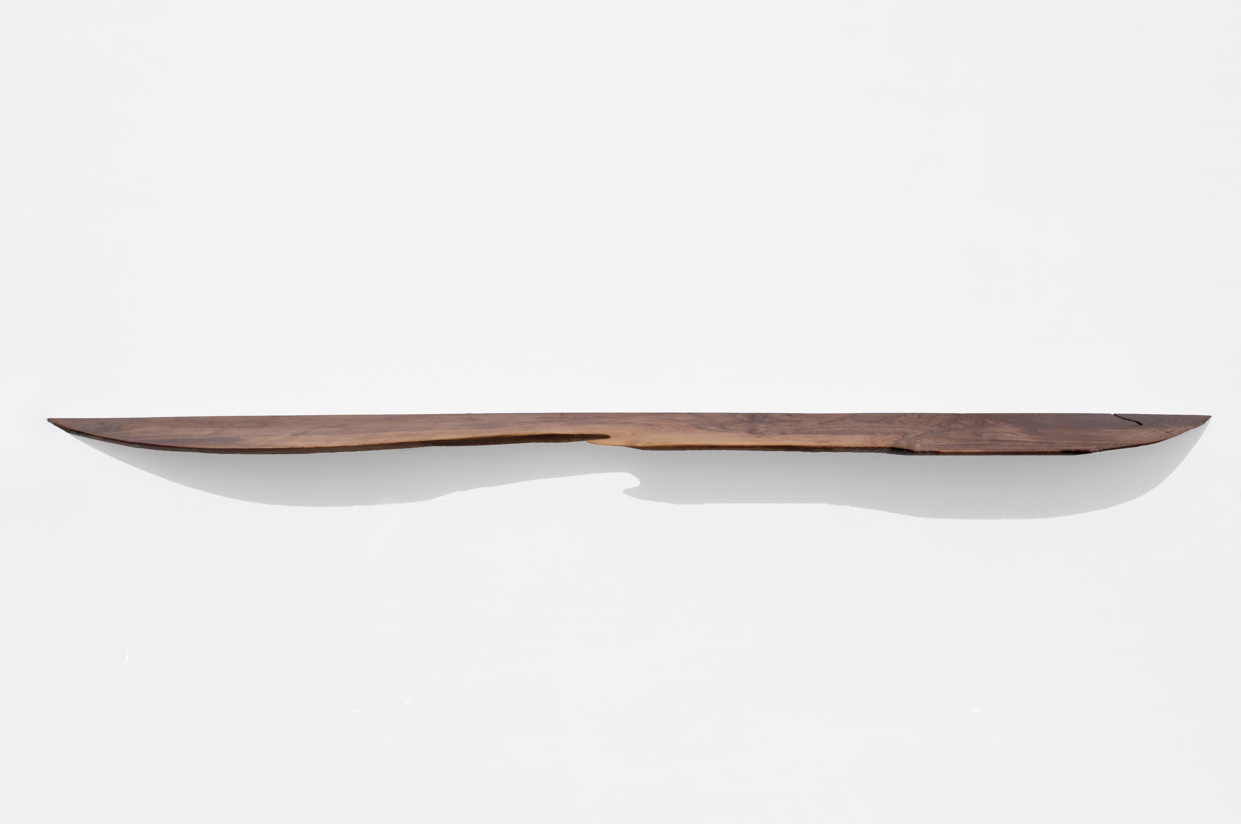W2330 Wall Hanging Shelf in Walnut Wood by Jörg Pietschmann
Dimensions: D 27,5 x W 245 x H 2 cm.
Materials: Walnut wood.

All wall shelves include steel pin holders for discreet mounting. Please contact us.

In Pietschmann’s sculptures, trees that