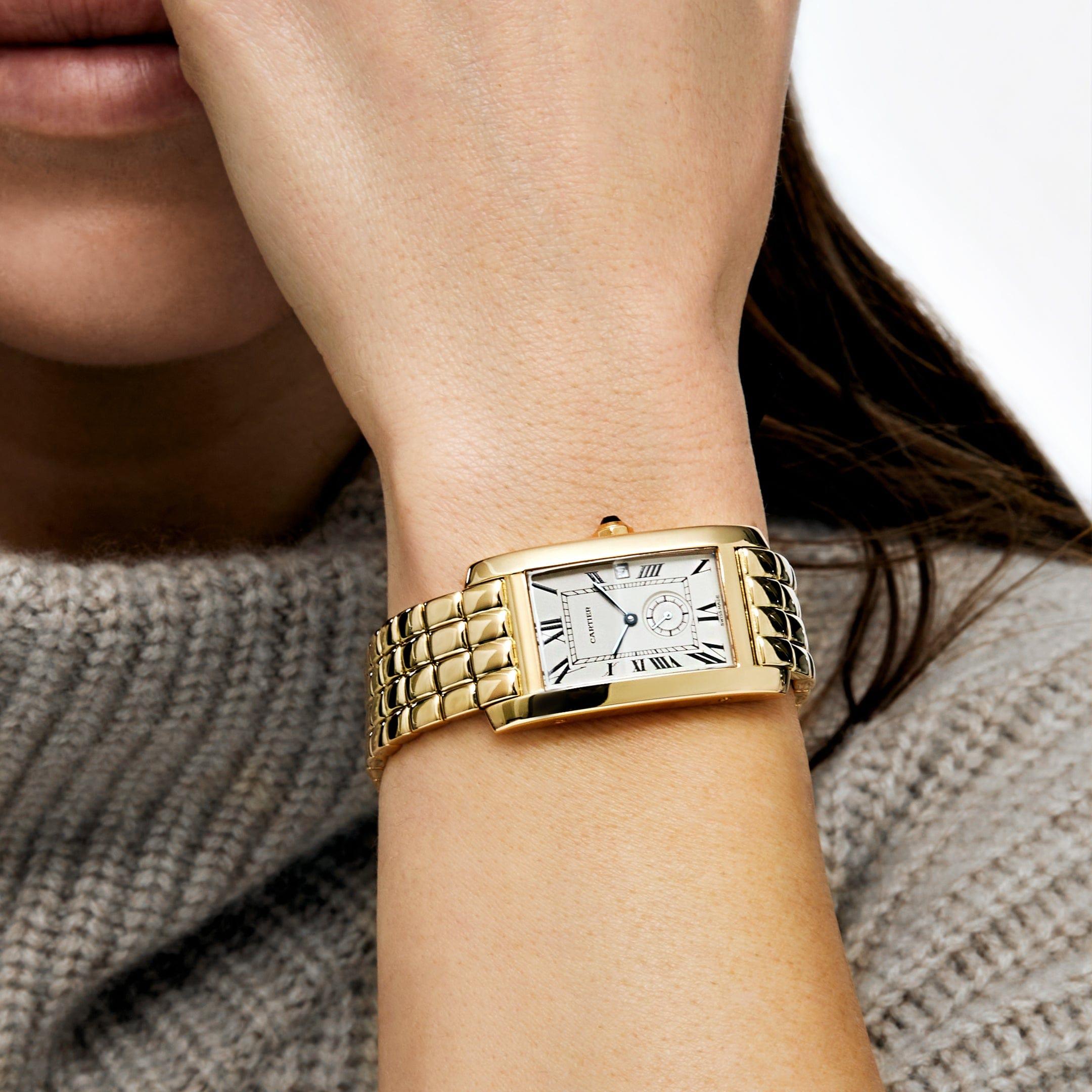 Jewels Aficionado offers the Cartier Tank Américaine W26001C9 embodies timeless elegance and sleek design, crafted in 18k yellow gold. Its elongated, slightly curved rectangular case offers a contemporary interpretation of Cartier’s iconic Tank
