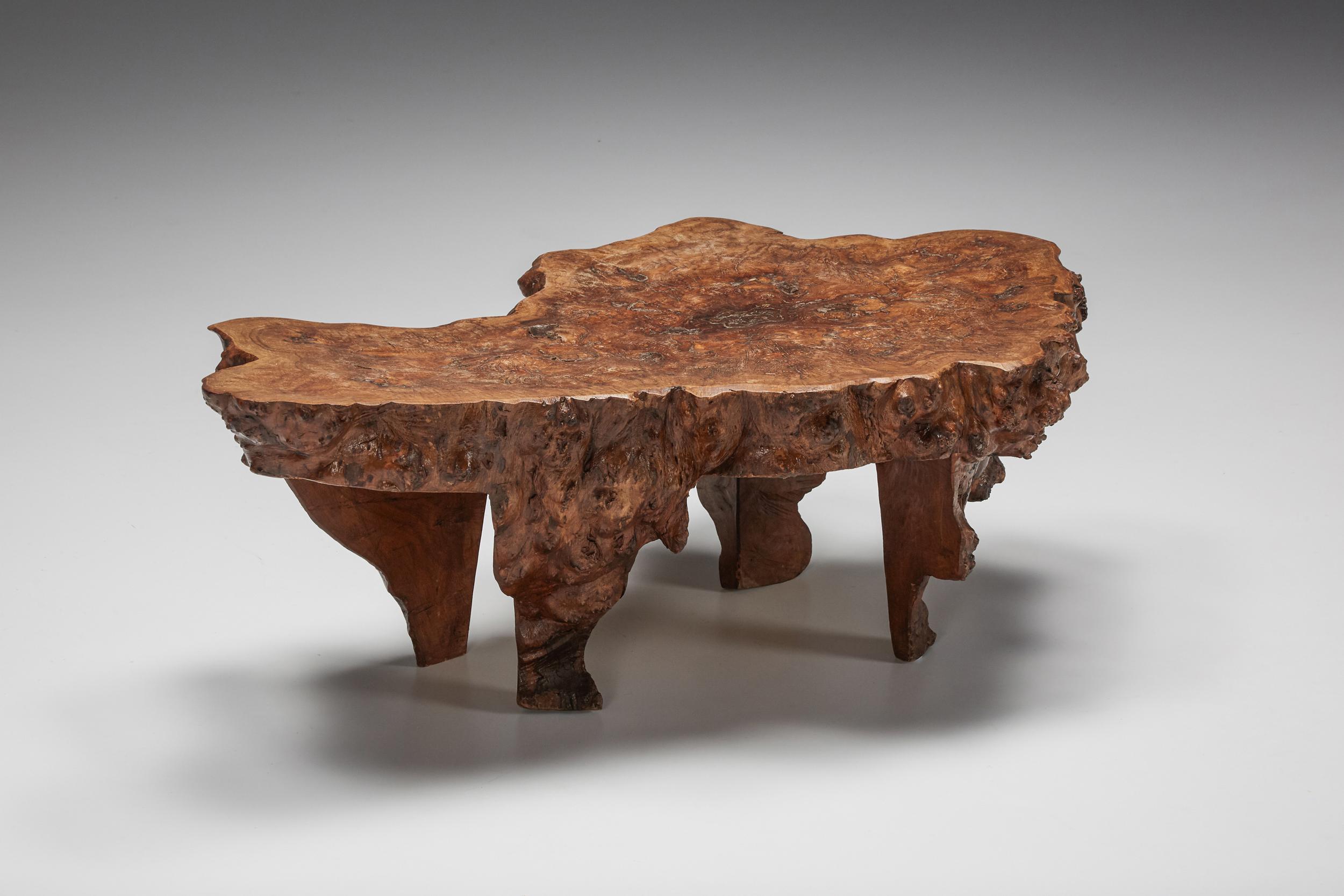 Burl wood coffee table Wabi-Sabi, Japanese Design, mid-19th century. 

This wooden chair perfectly embodies the enduring Japanese concept of 'wabi-sabi'. Made from an ancient piece of wood characterized by significant fissures and gaps, the artist