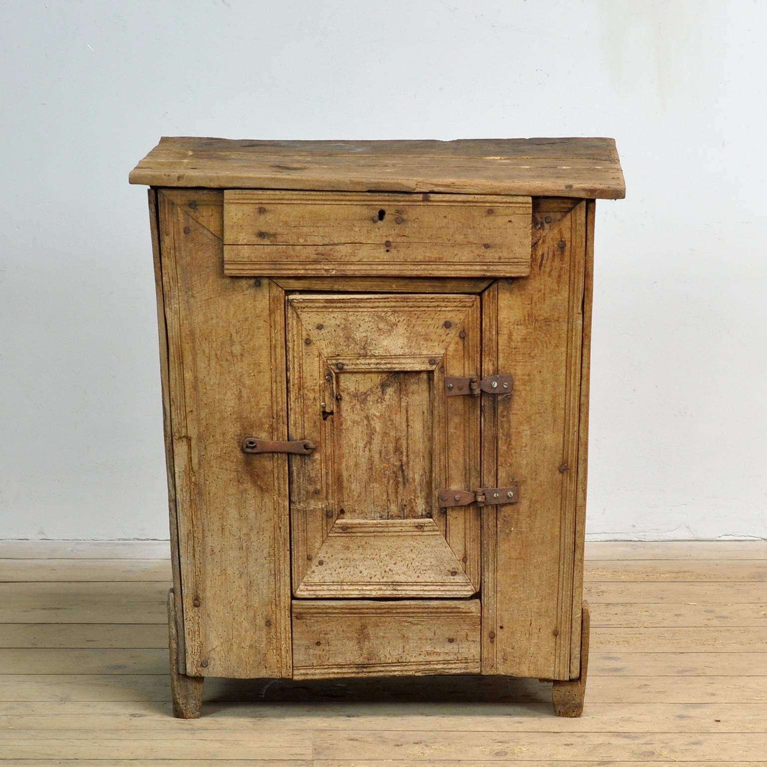 Primitive cabinet made of beech wood circa 1850. A shelf on the inside. This is a cabinet from a very modest home in the highlands of the Carpathians. It is a small miracle that this cabinet has survived the test of time.