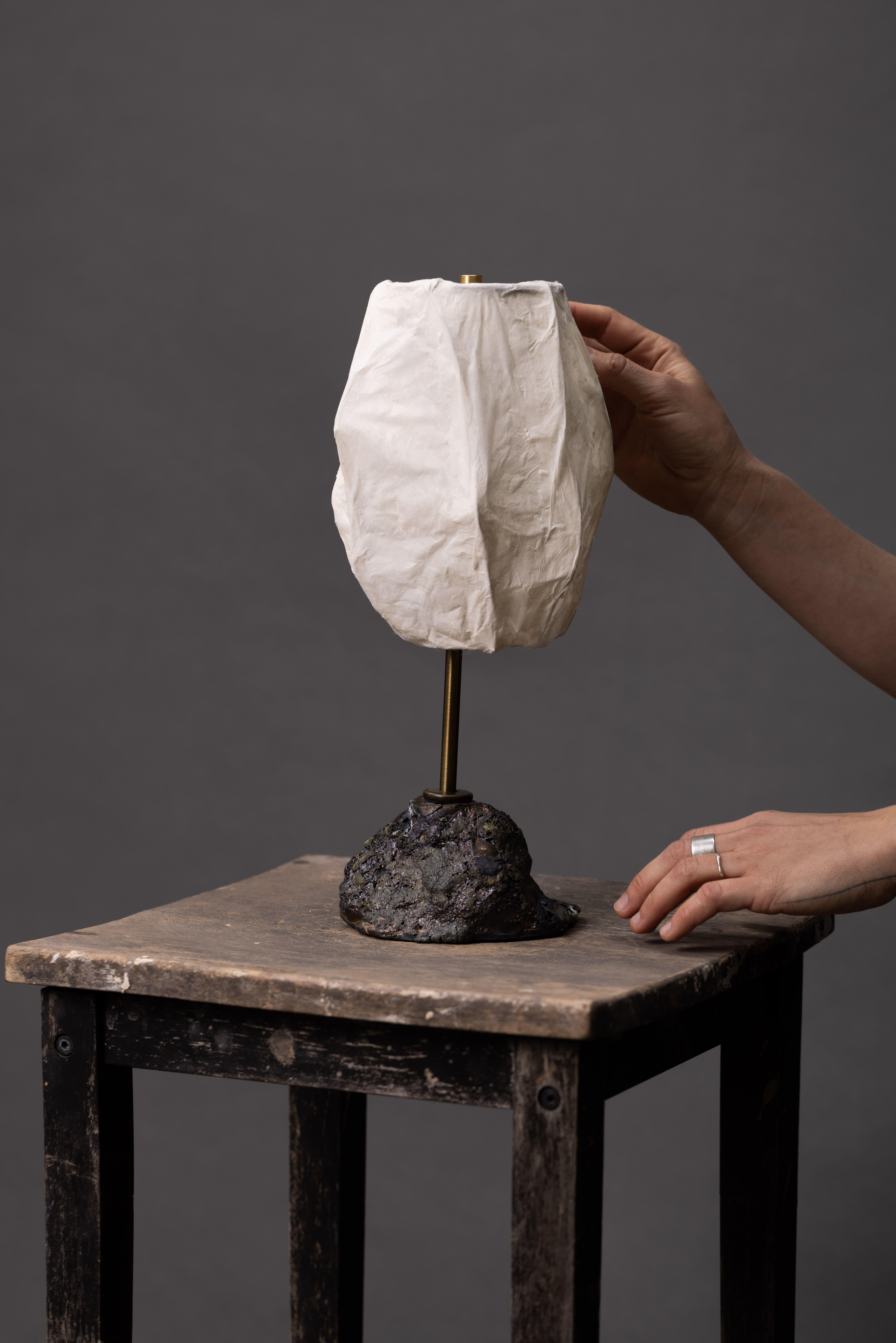 This handcrafted ceramic table lamp is designed with intention and a love for natural beauty. It features a raw, textured surface that highlights all those little imperfections—totally inspired by the calming, imperfectly perfect vibe of wabi-sabi