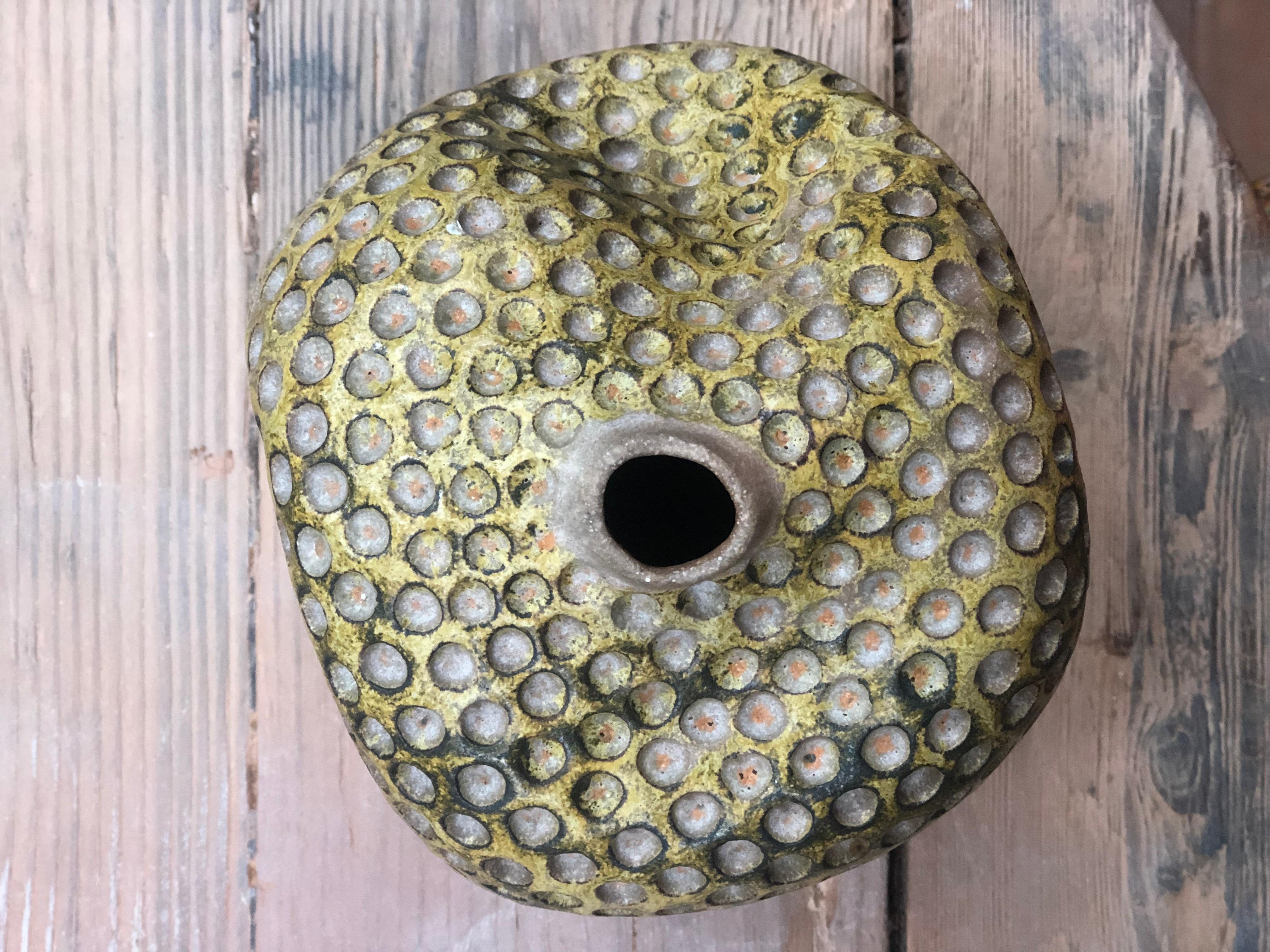 Joseph Skoby is a Southern Californian whose work is inspired by the nature of his native state. His ceramics, created in his own lush garden, recall his intimate dance with the ocean as a lifelong surfer—a pure form of self-expression that