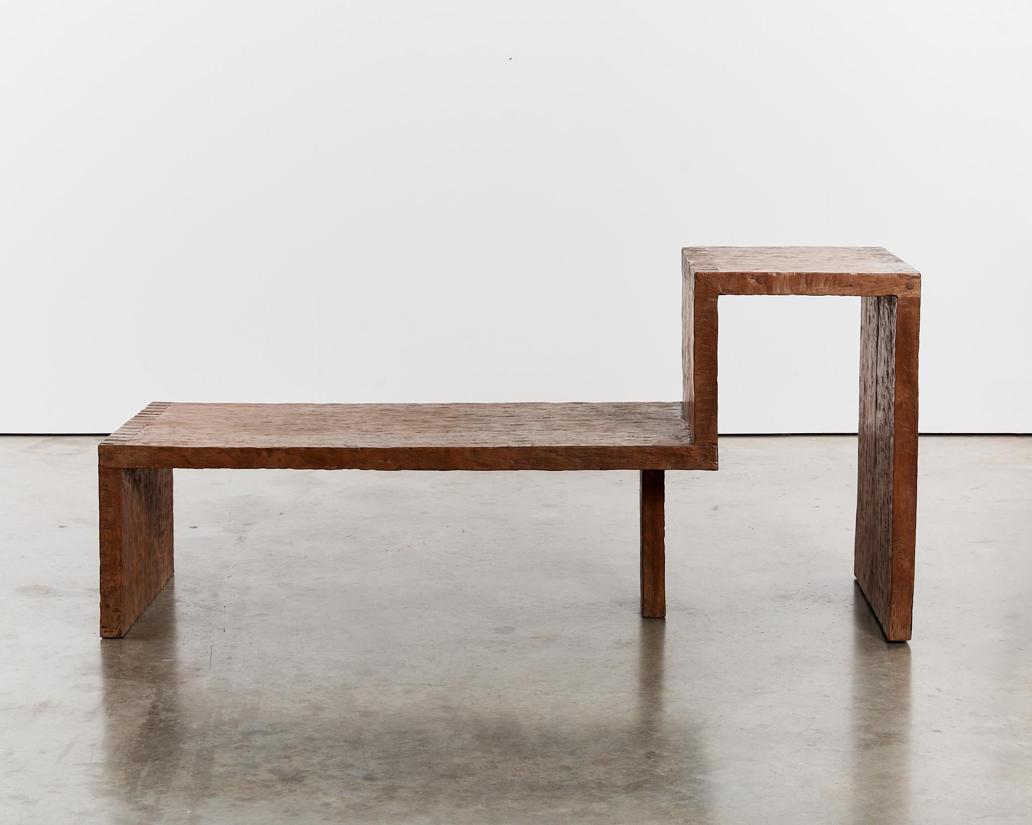 Wabi sabi hardwood bench with finger joinery and hand-chiselled surface. This substantially proportioned piece doubles a statement bench or occasional table.
Good vintage condition, with newly waxed finish
