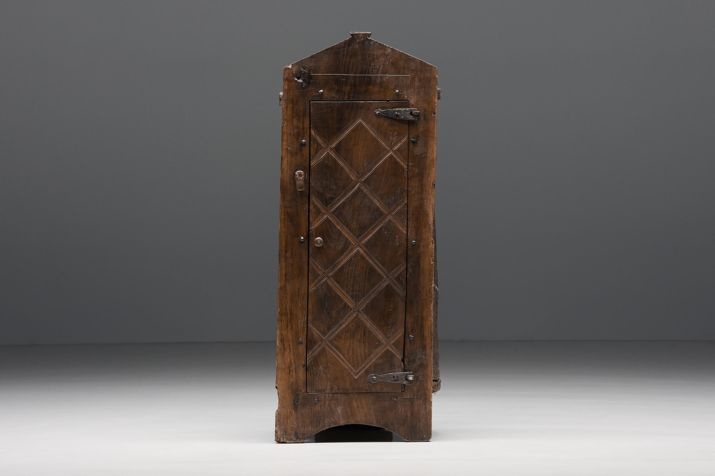Rustic; Robust; Wabi Sabi; Travail Populaire; Folk Art; Travail Art Populaire; Cabinet; Storage Piece; Storage Unit; Wood; France; Monoxyle; Hand Carved; Organic; Alpine; Luxury Chalet Style;

French 19th-century travail populaire, folk art,