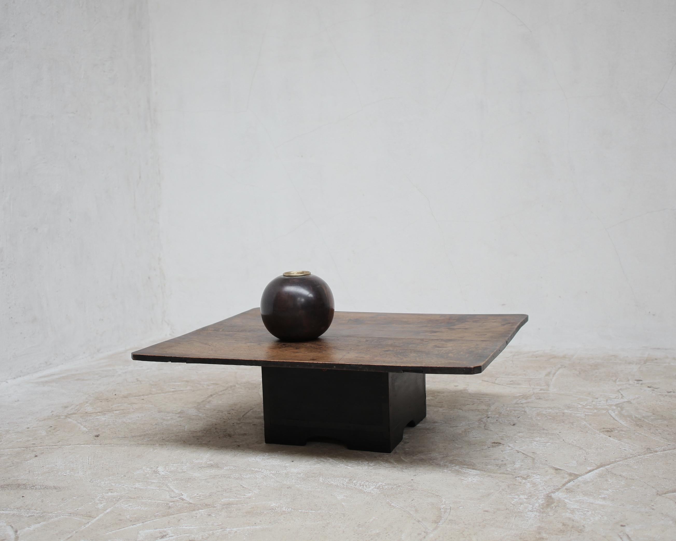 A unique heavily patinated cedar coffee table on weighted charred pine base.

Made using 19th century Japanese elements in our London workshop. 

-

We offer free shipping to Canada/USA.