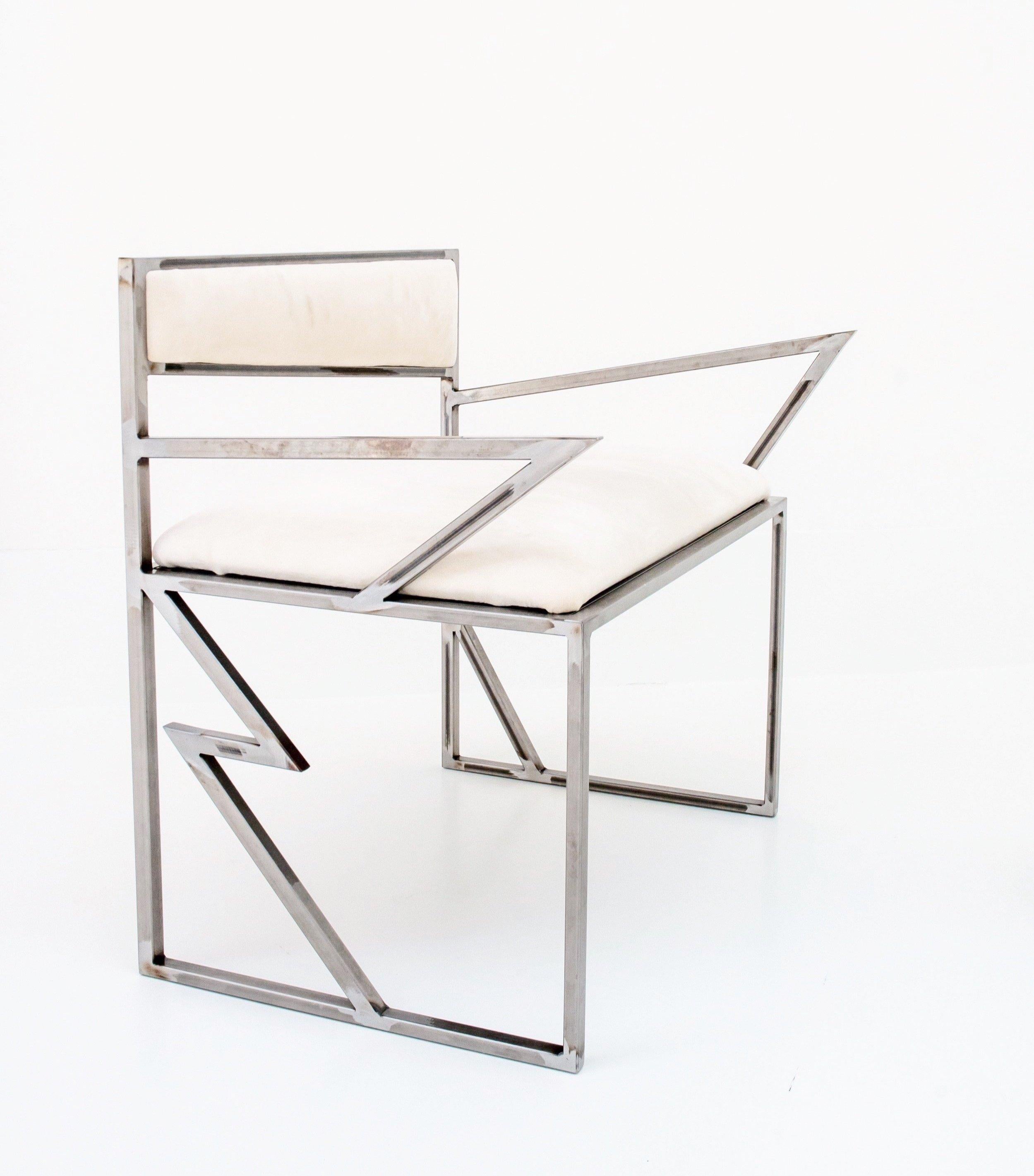 These collectible design dining chairs are made of clear gloss coated raw steel combined with ecru white velvet upholstery. It is a set of four different pieces. The chairs are designed by female artist / designer Roos Schneijderberg. The