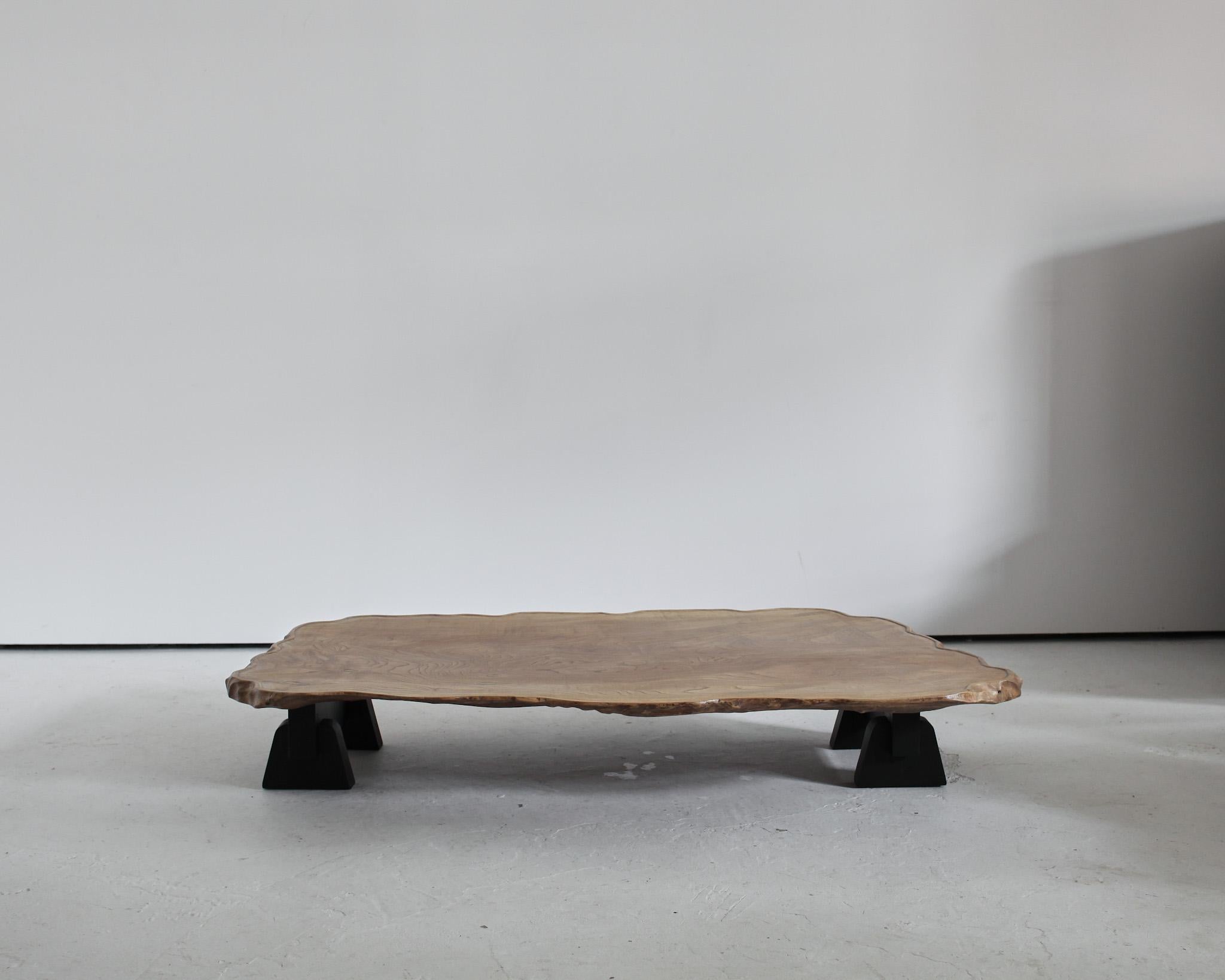A bleached-out naturalistic Japanese low table.
A solid single piece top on ebonized cedar feet.
Made using 19th & early 20th century Elements in our London workshop.