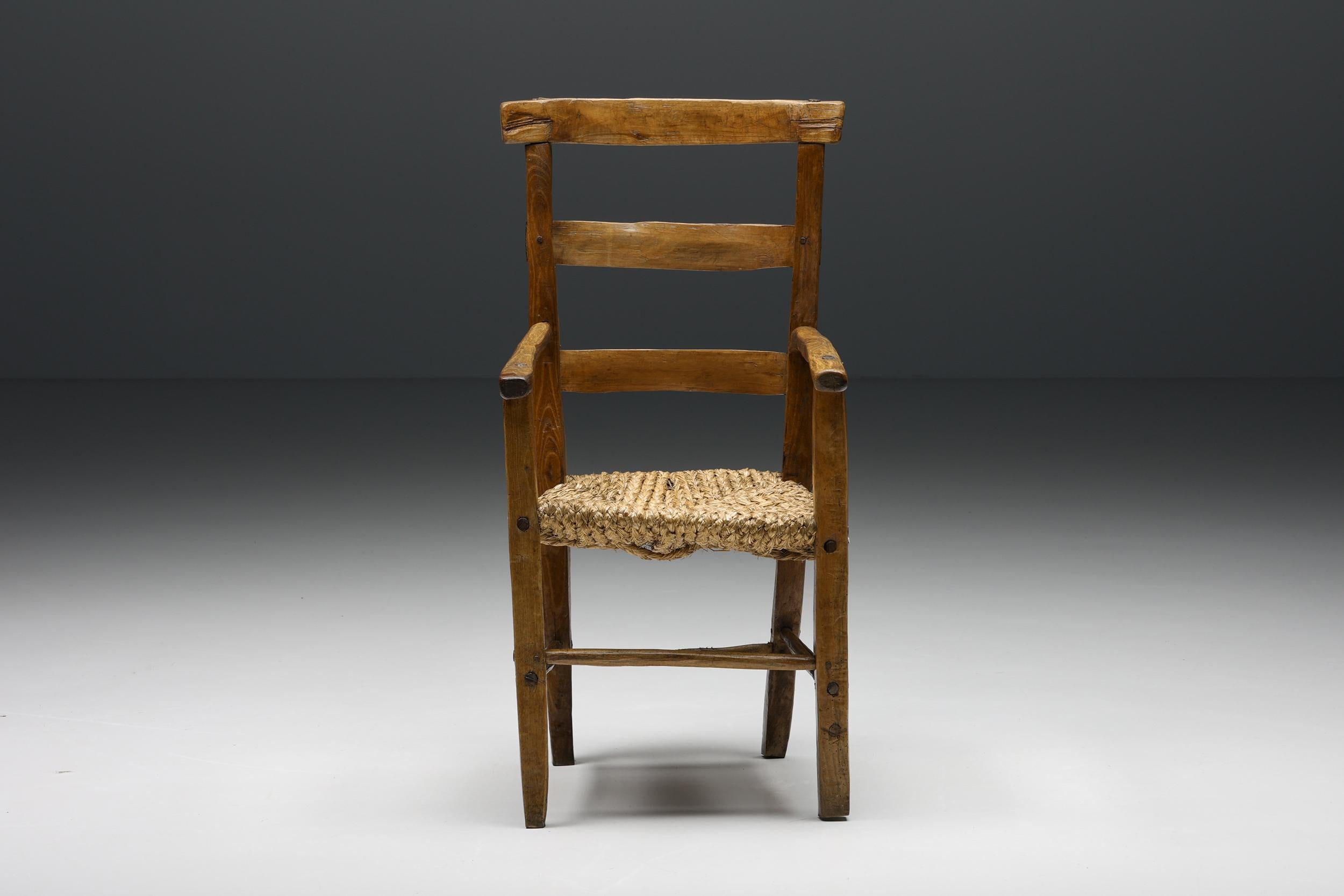 Wabi-Sabi Rustic Cord Arm Chair, French craftsmanship, 1940's

Rustic armchair with comfortable cord seating and an imperfect, wabi-sabi wooden structure. A remarkable example of French craftsmanship. This chair would fit well in a Mid-Century