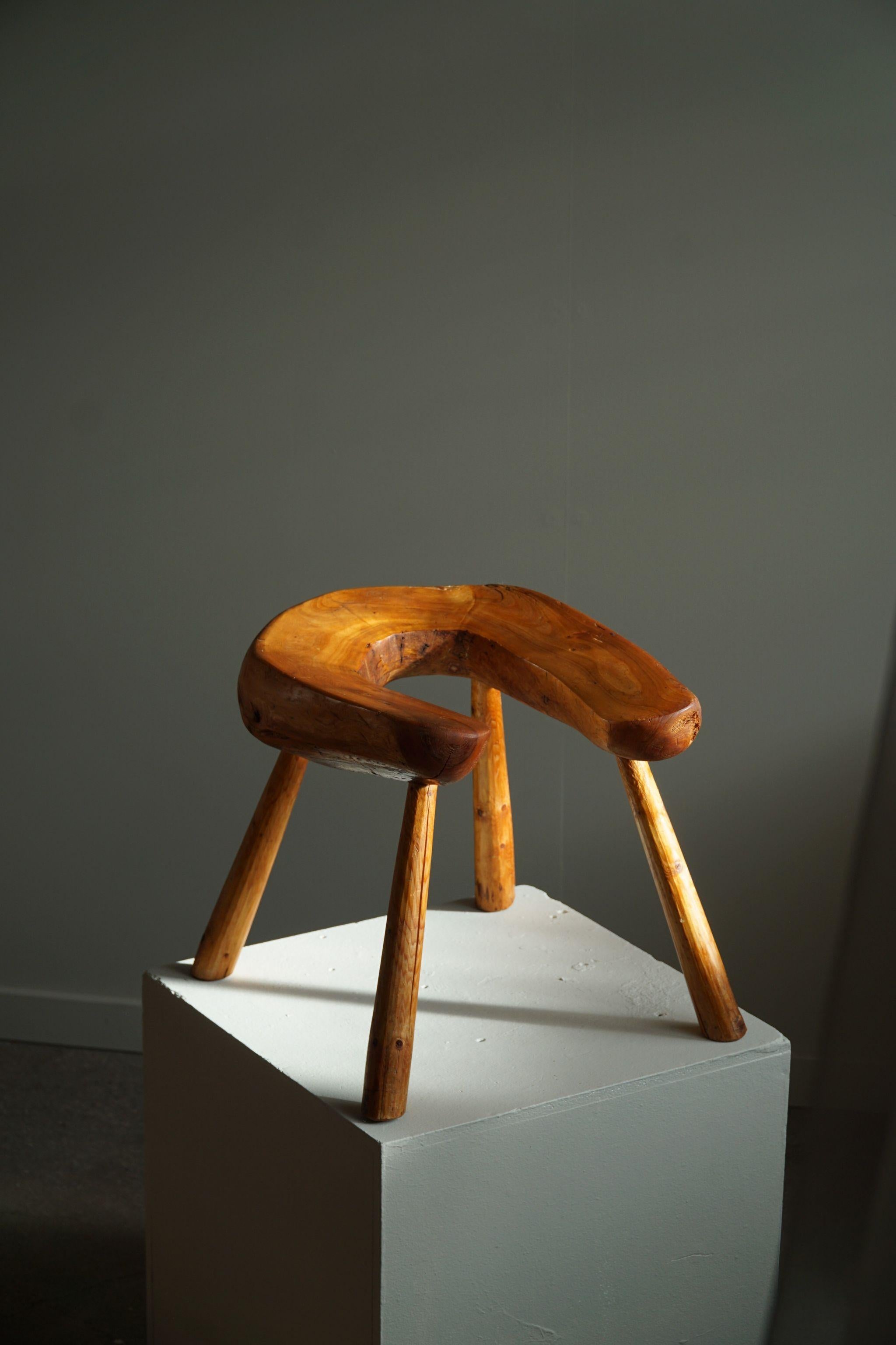 Decorative Scandinavian stool with organic shape in solid pine. Hand carved by a Swedish cabinetmaker in 1950s.

This wabi sabi stool will fit in many types of home decors. Modern, Scandinavian or an Art Deco interior style.

A beautiful vintage