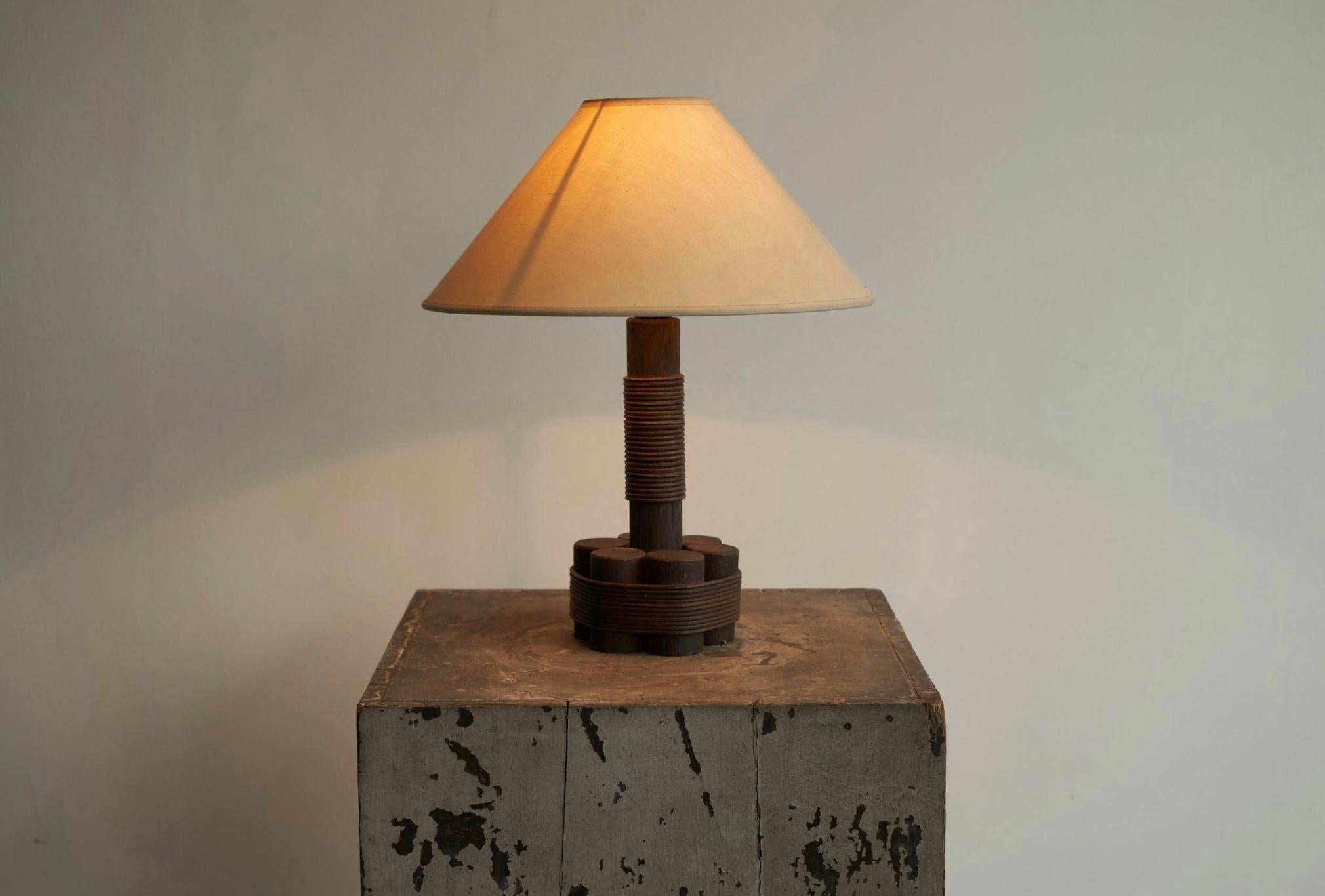 Table Lamp in Bamboo and Rattan 1970s.

Great and very atmospheric table lamp in bamboo and rattan, made somewhere in the 1970s.

The lamp features a simple, but very sophisticated design with only a few pieces of bamboo which is being kept together