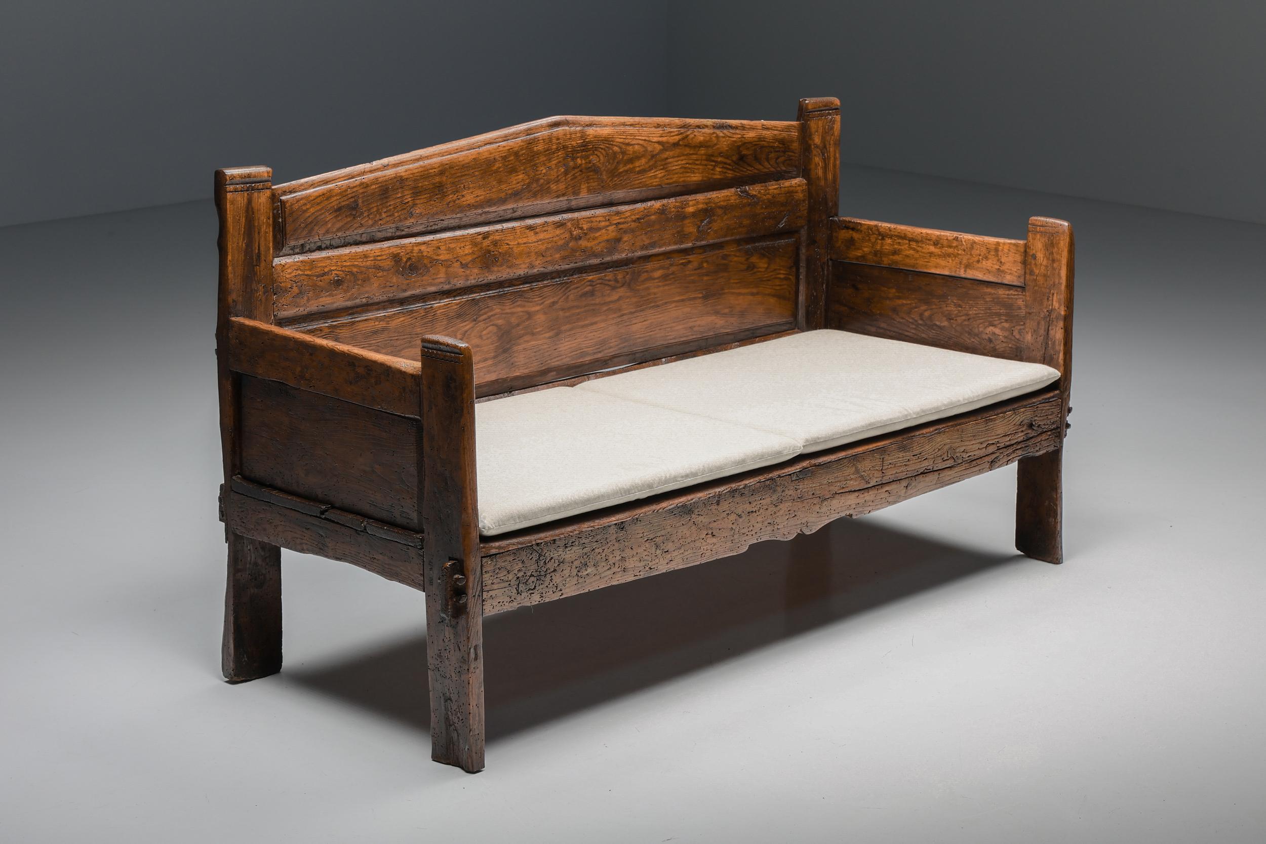 Wabi-Sabi three seater bench, Monoxylite, Haut Savoie, Breton, 19th century

This rustic bench seats three people comfortably. The patina on the monoxylite wood speaks to the great history of this 19th-century piece. This piece includes two