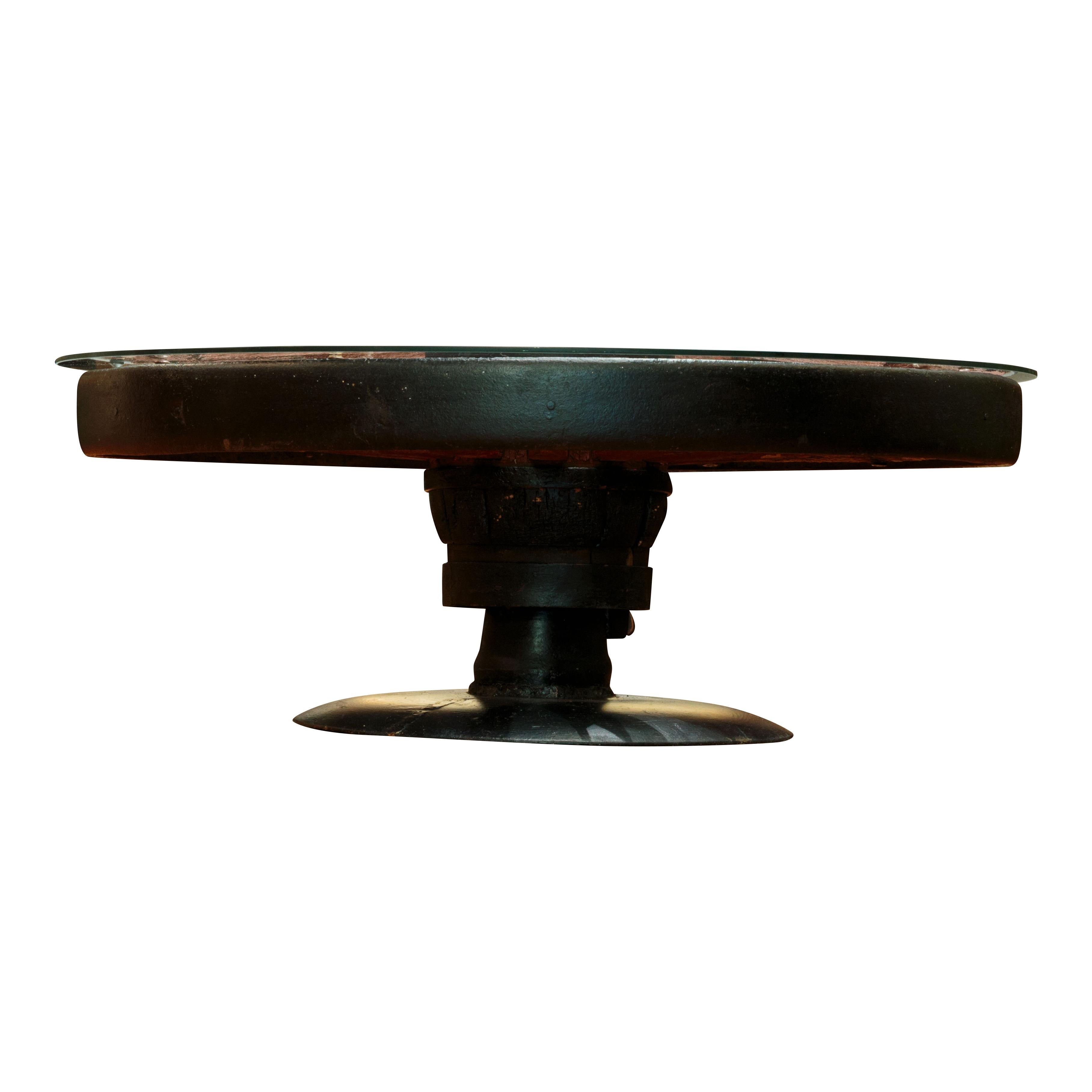 Wagon wheel coffee table with wood hub and iron band, base from horse drawn disk. Nice and authentic. Ships without glass. 

Period: Contemporary
Origin: Northwest
Size: 36