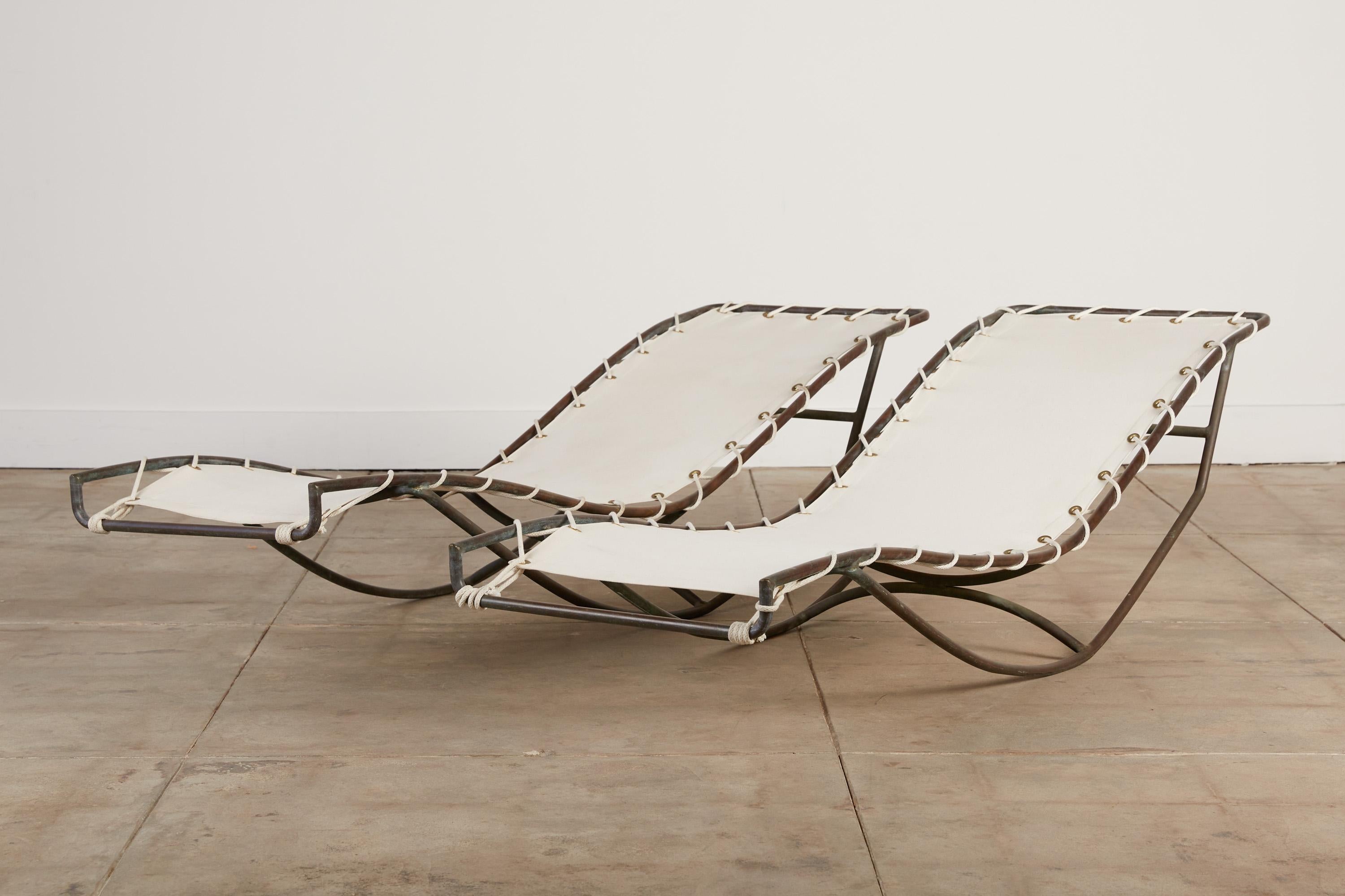 Bronze rocking lounge chair designed by Walter Lamb and produced by Brown Jordan. The design, referred to as the “Waikiki” chair, has a boat-like shape in tubular bronze with a sinuously curved seat on a pair of bent runners. Three C-shaped supports