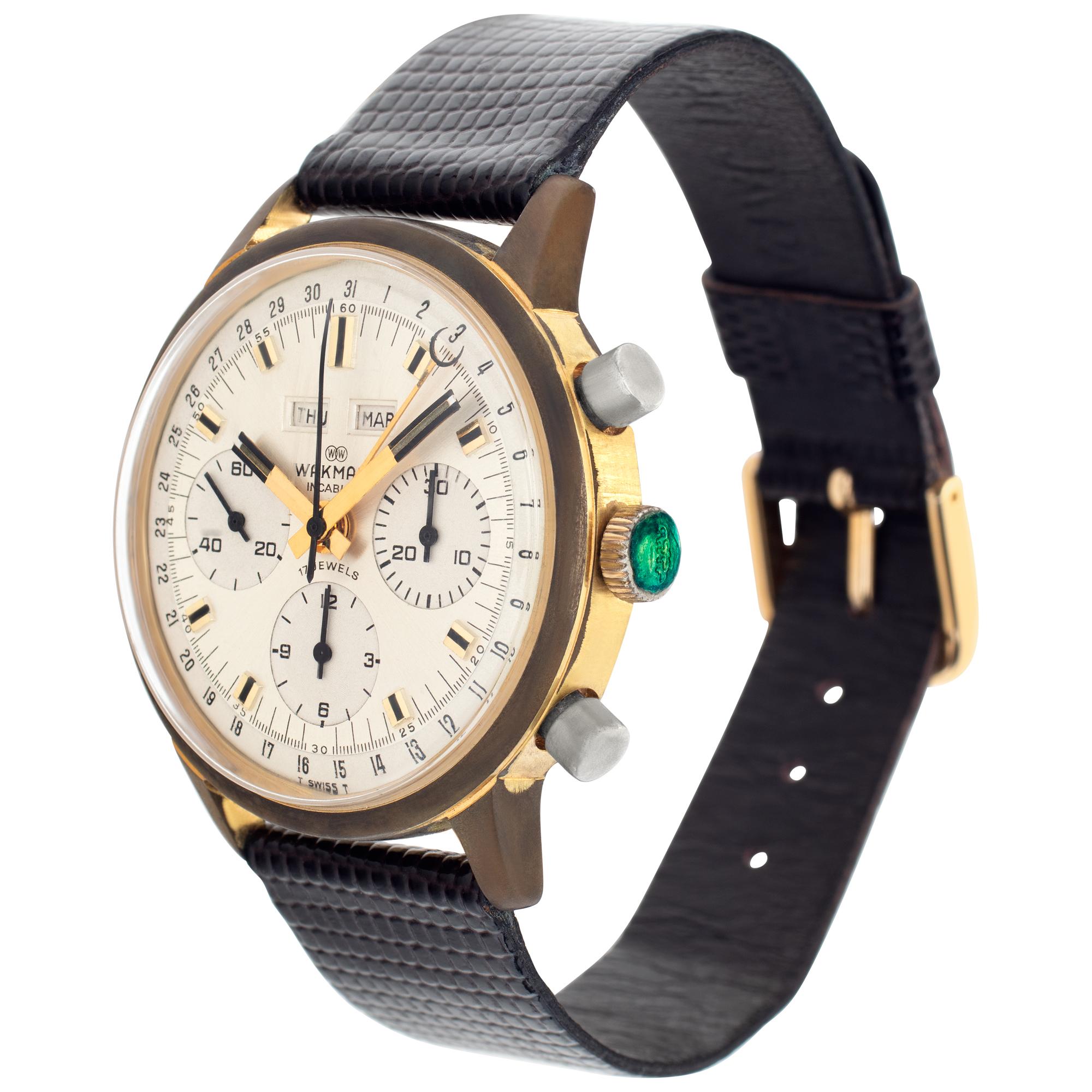 Vintage Wakmann Incabloc in stainless steel & gold plate on a dark brown lizard strap. Manual w/ subseconds, date, day, month and chronograph. 39 mm case size. Fine Pre-owned Wakmann Watch. Certified preowned Vintage Wakmann Incabloc watch is made