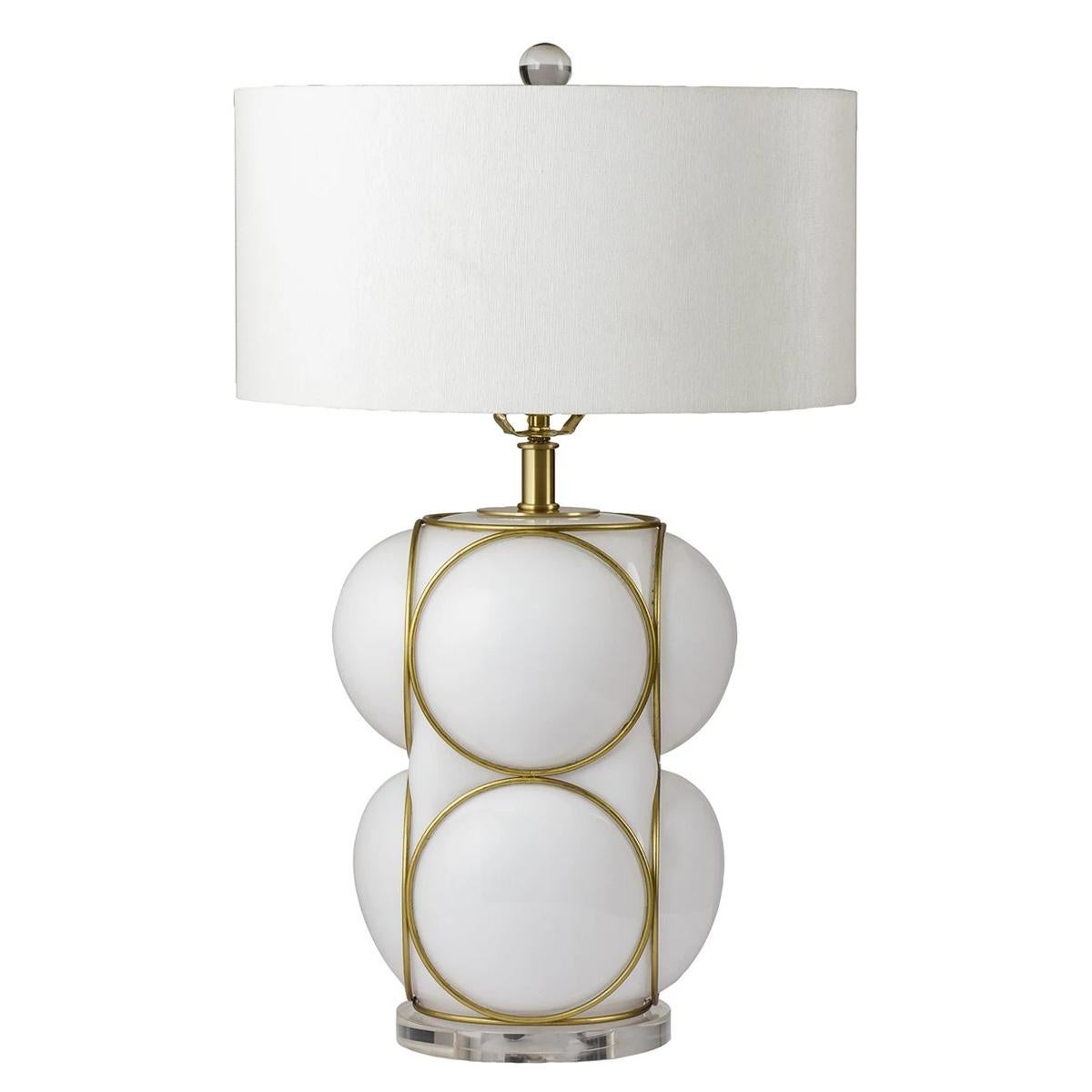 Table lamp Walberg White with white glass base with
brass trims. On plexiglass round base. 1 bulb, lamp
holder type E27, max 40 watt. 220 Volt. Bulb not included.
Including a white coton shade.