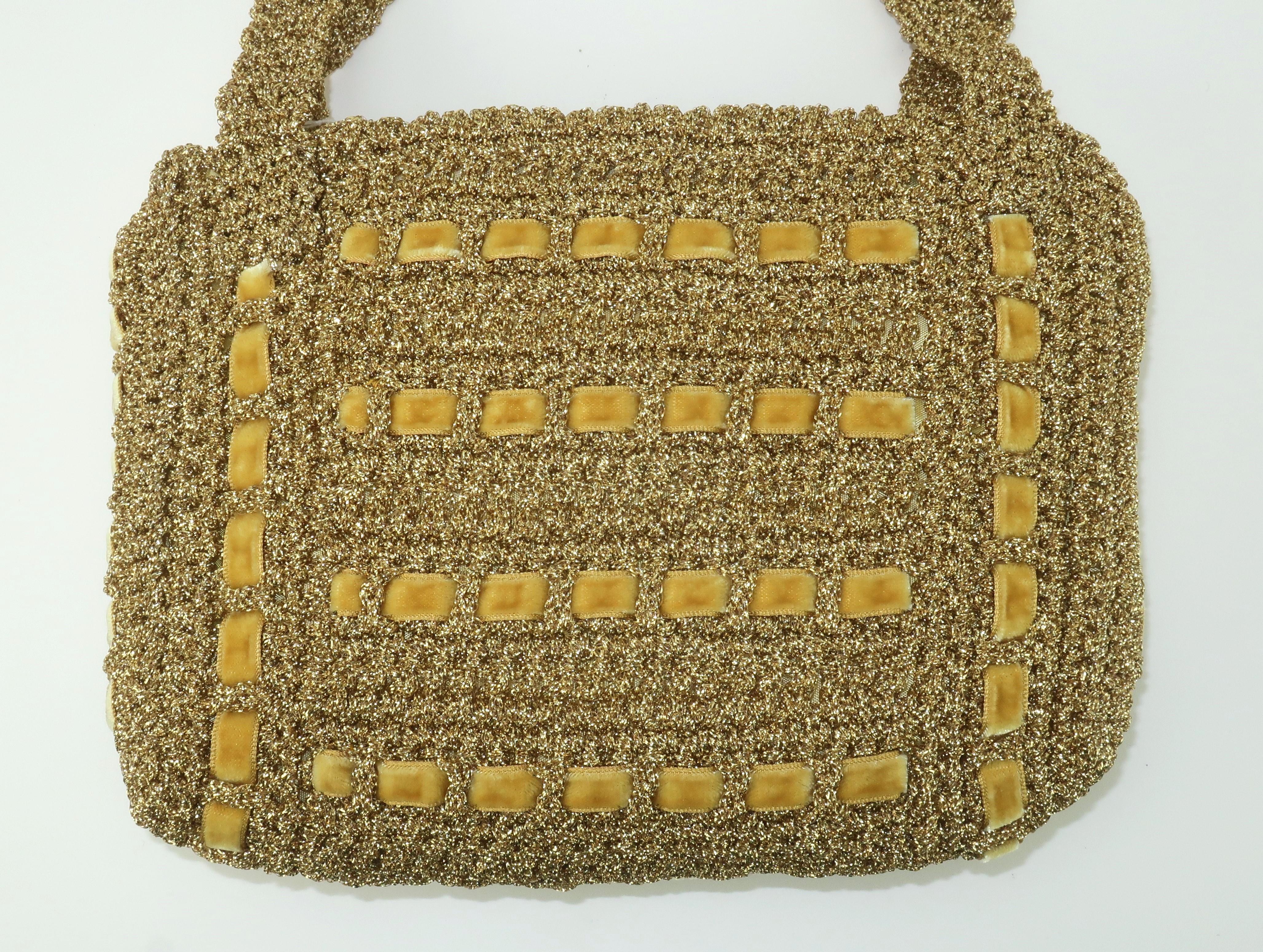 Boho meets mod in this fun 1960's gold crochet handbag made in Italy for Walborg.  Hilde Walborg founded her company in the 1940's and produced classically styled handbags that offered a little something different for a special occasion.  This bag
